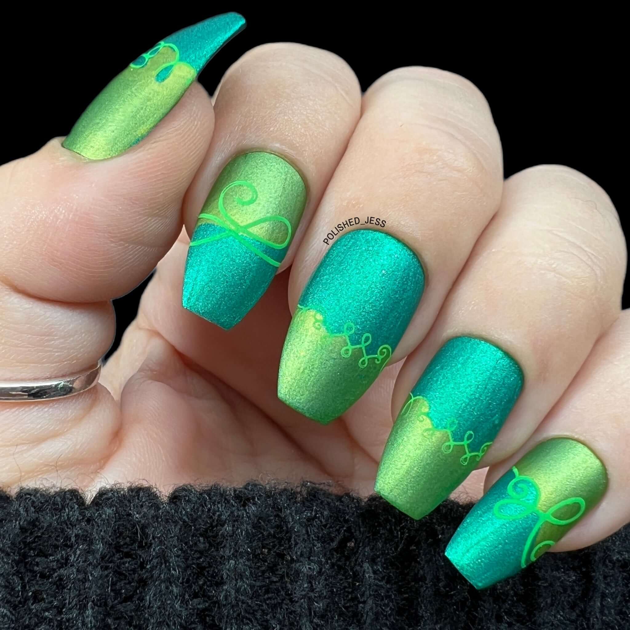 Bright-green-shimmery-manicure-with-nail-art-swirly-french-tip-designs