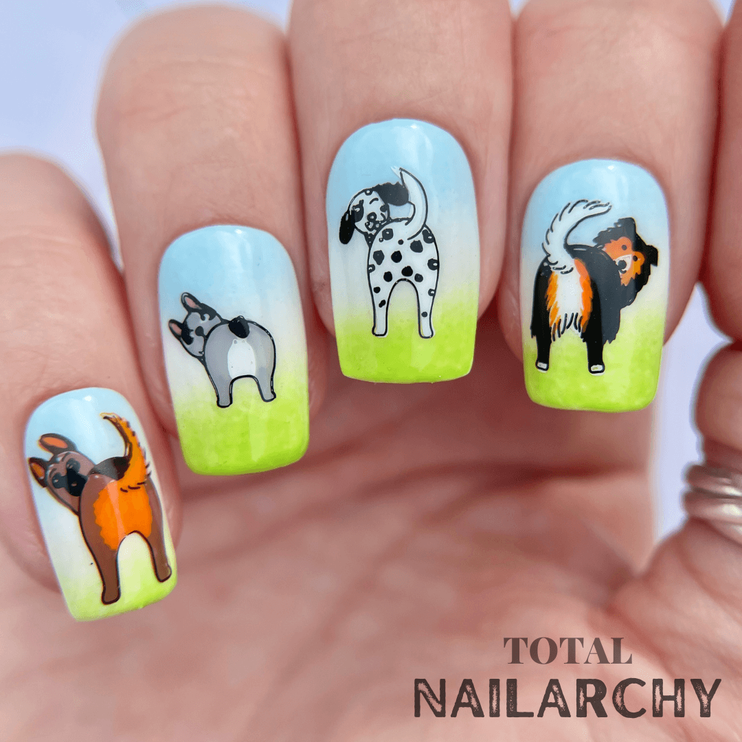 Beautiful-manicure-showing-nail-art-designs-of-dogs-wagging-their-tails