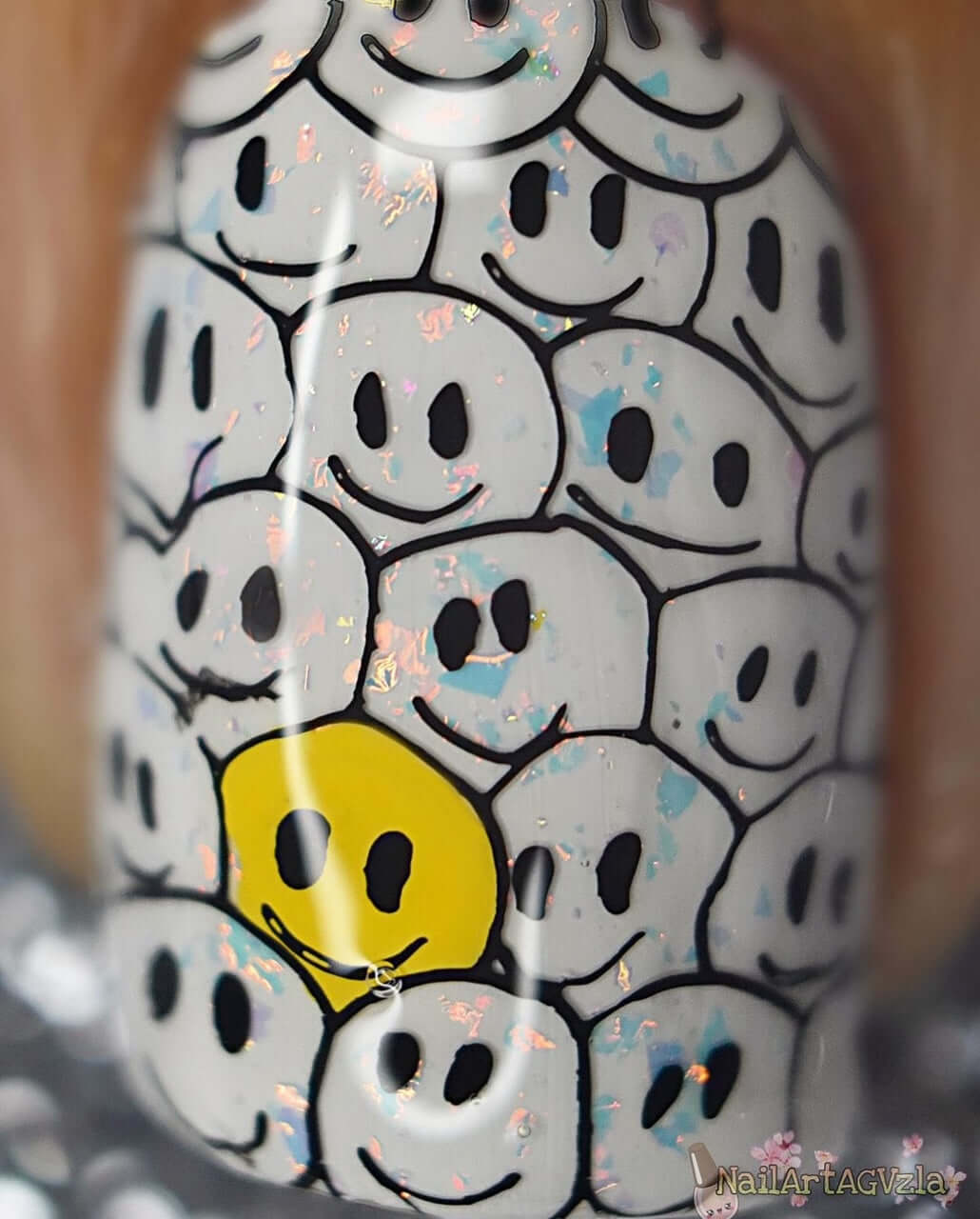 Single-manicure-nail-showing-full-coverage-nail-art-designs-of-smiley-faces