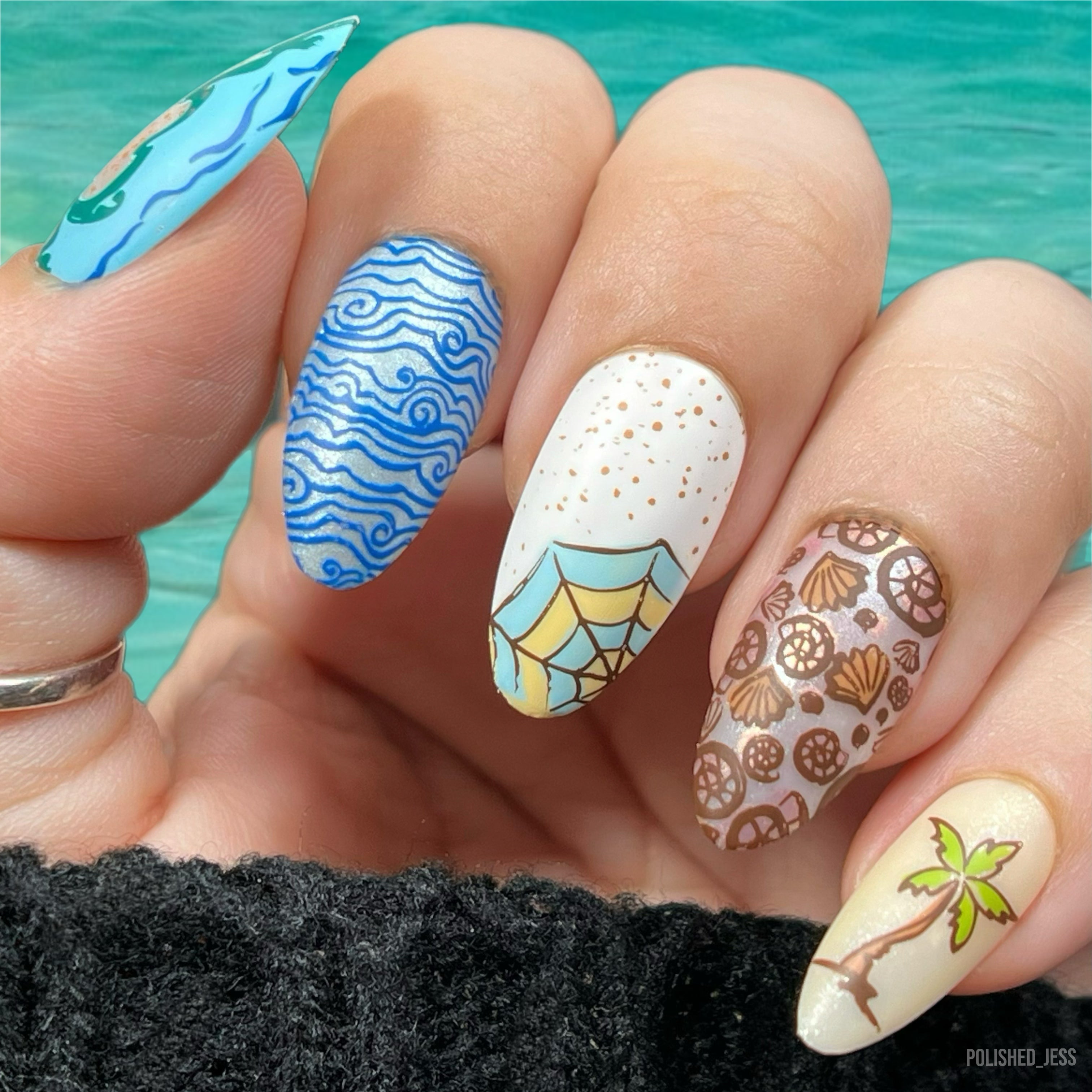 beautiful-manicure-with-beach-themed-nail-art-designs-of-seashells-palm-trees-and-waves