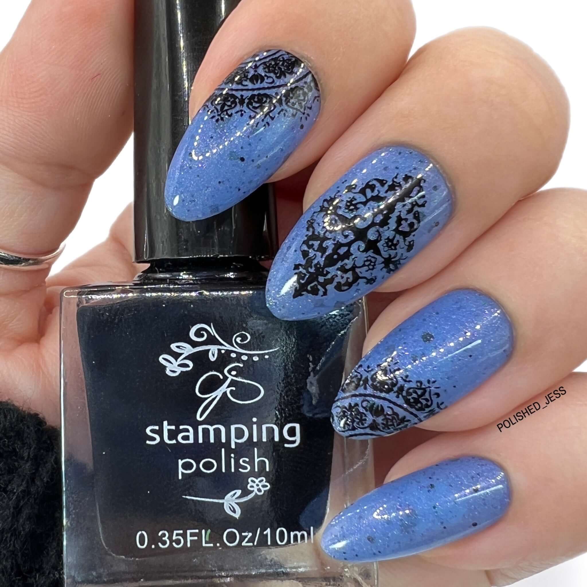 manicure-showing-lace-nail-art-stamping-designs