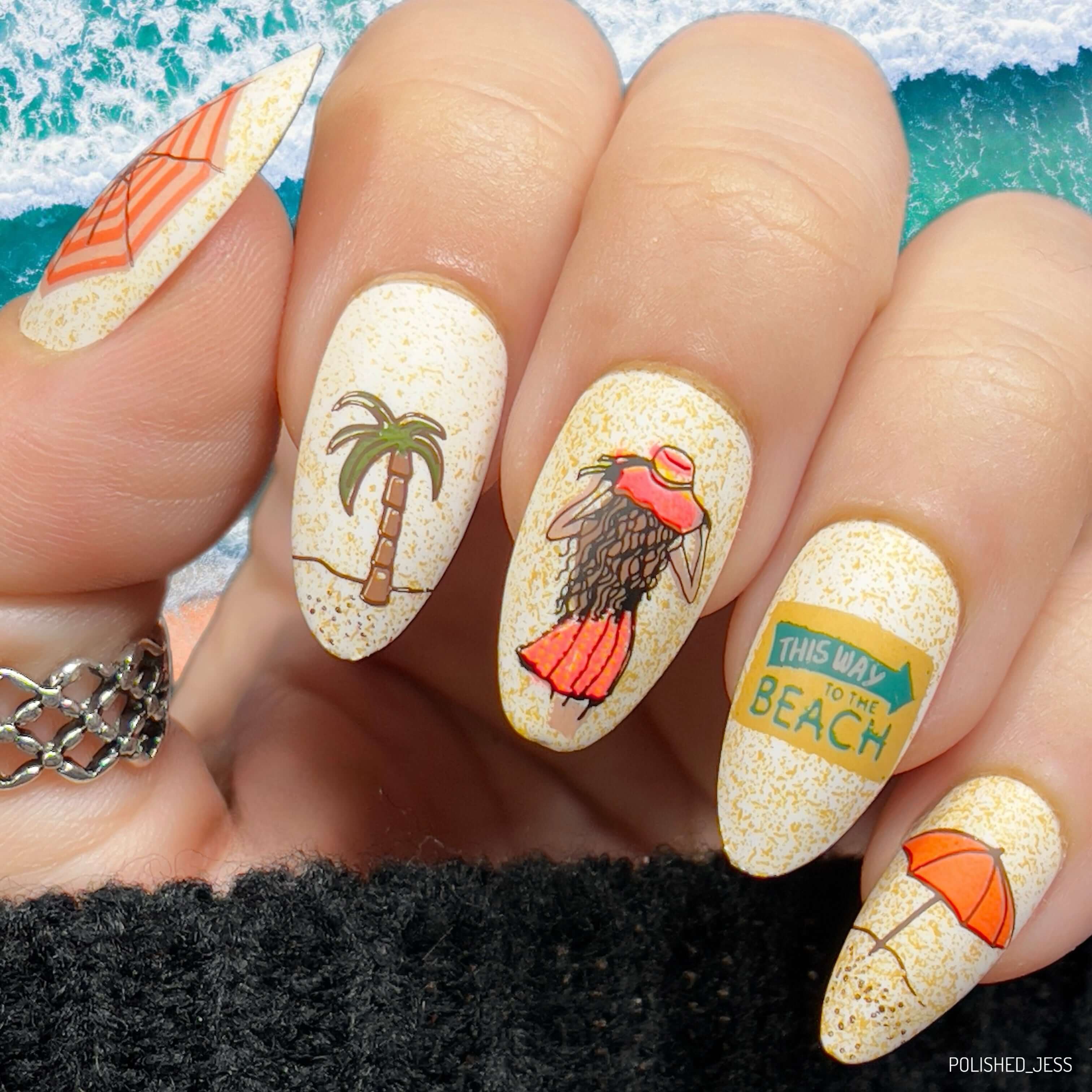 stunning-manicure-showing-beachy-nail-art-designs-of-a-plam-tree-sun-umbrella