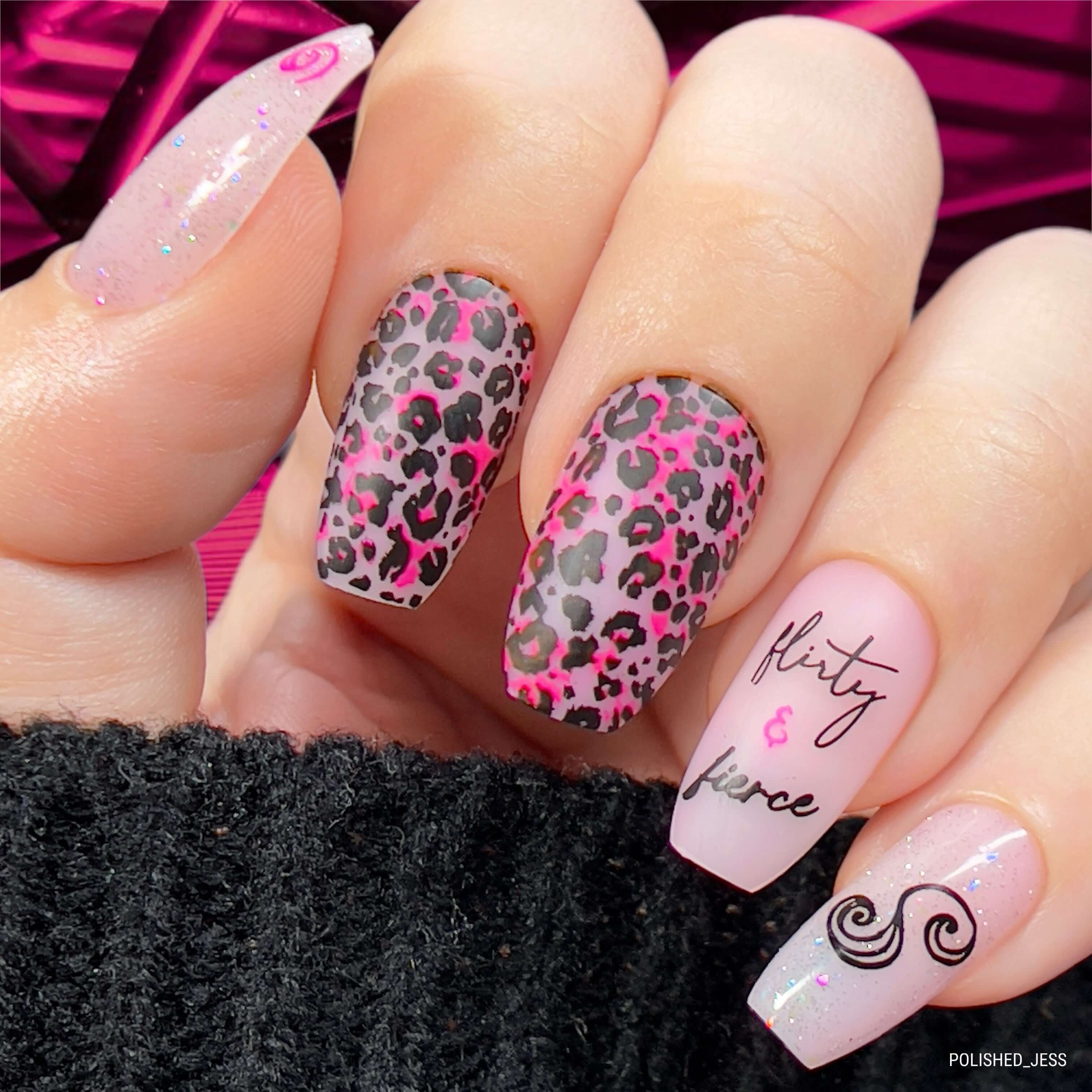 stunning-manciure-with-nail-art-designs-of-cheetah-print-swirls-and-the-words-flirty-and-fierce