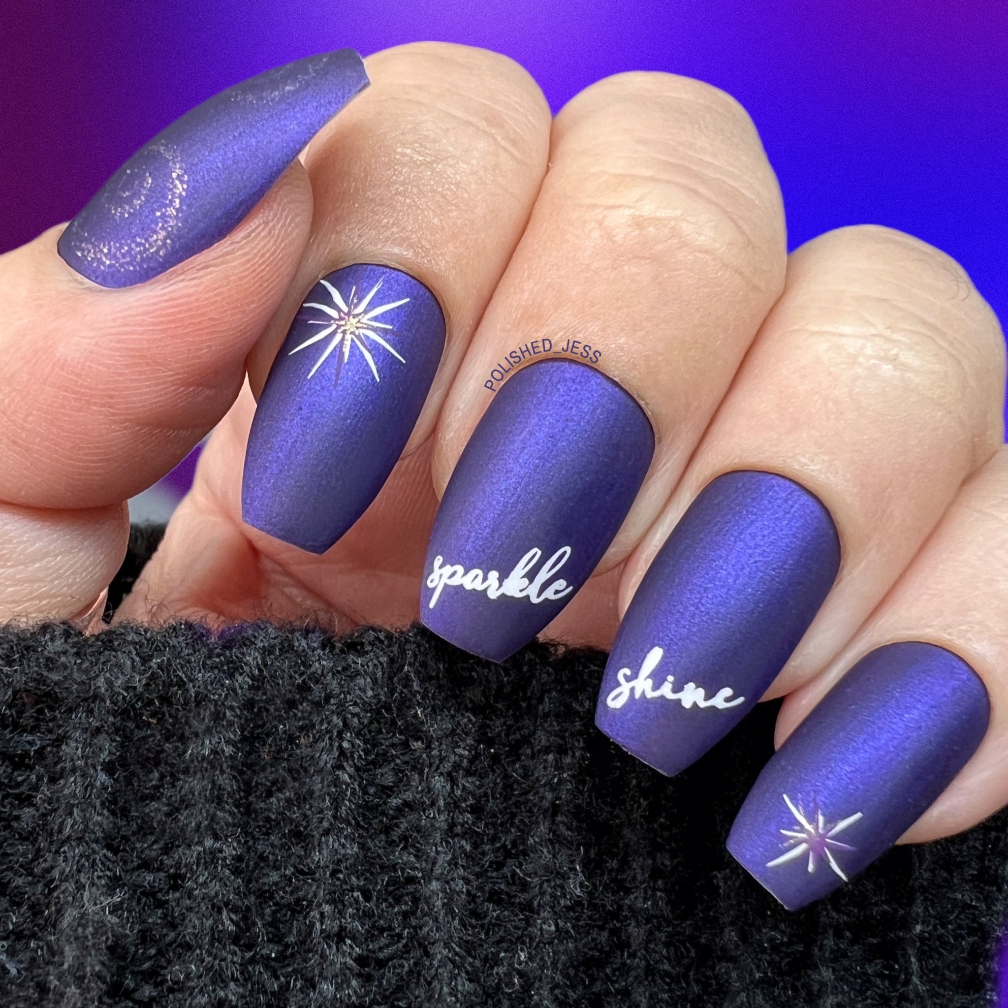 stunning-manicure-showing-nail-art-designs-of-stars-and-the-words-sparkle-and-shine