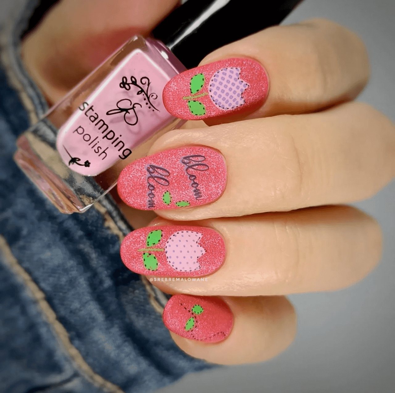 Goregous-manciure-with-nail-art-designs-of-patterned-flowers-and-the-words-bloolm-bloom