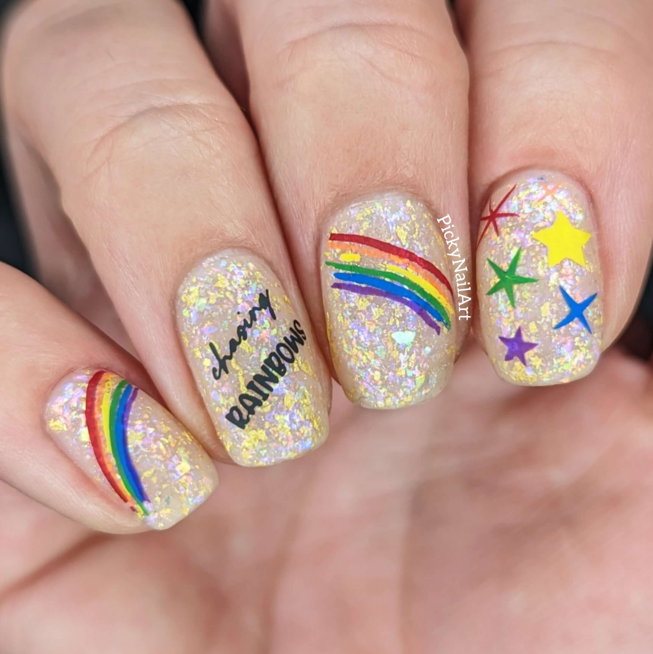 manicure-with-nail-art-words-chasing-rainbows-and-designs-of-rainbows-and-stars