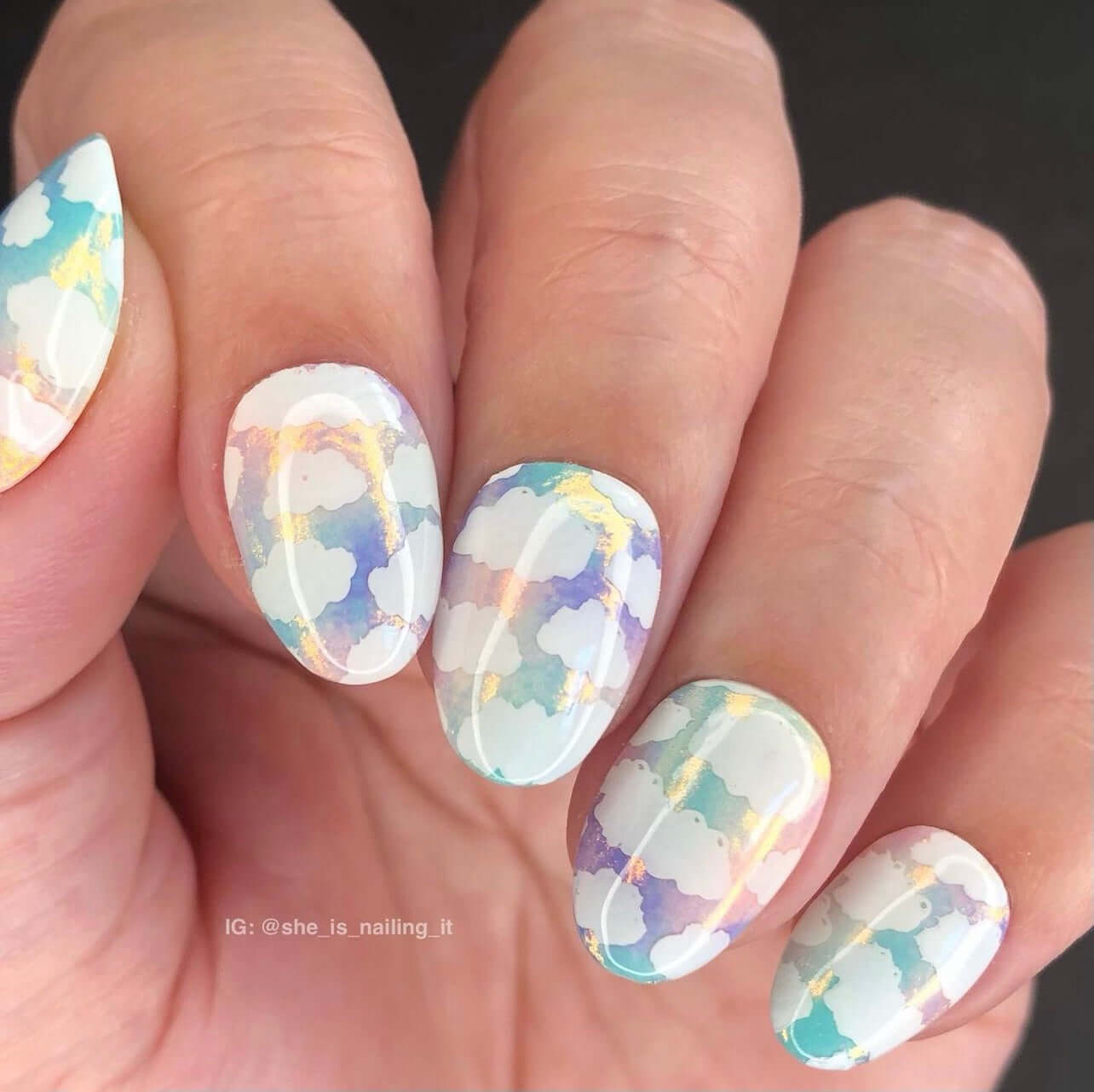 beautiful-holo-manicure-showing-nail-art-designs-of-full-coverage-clouds