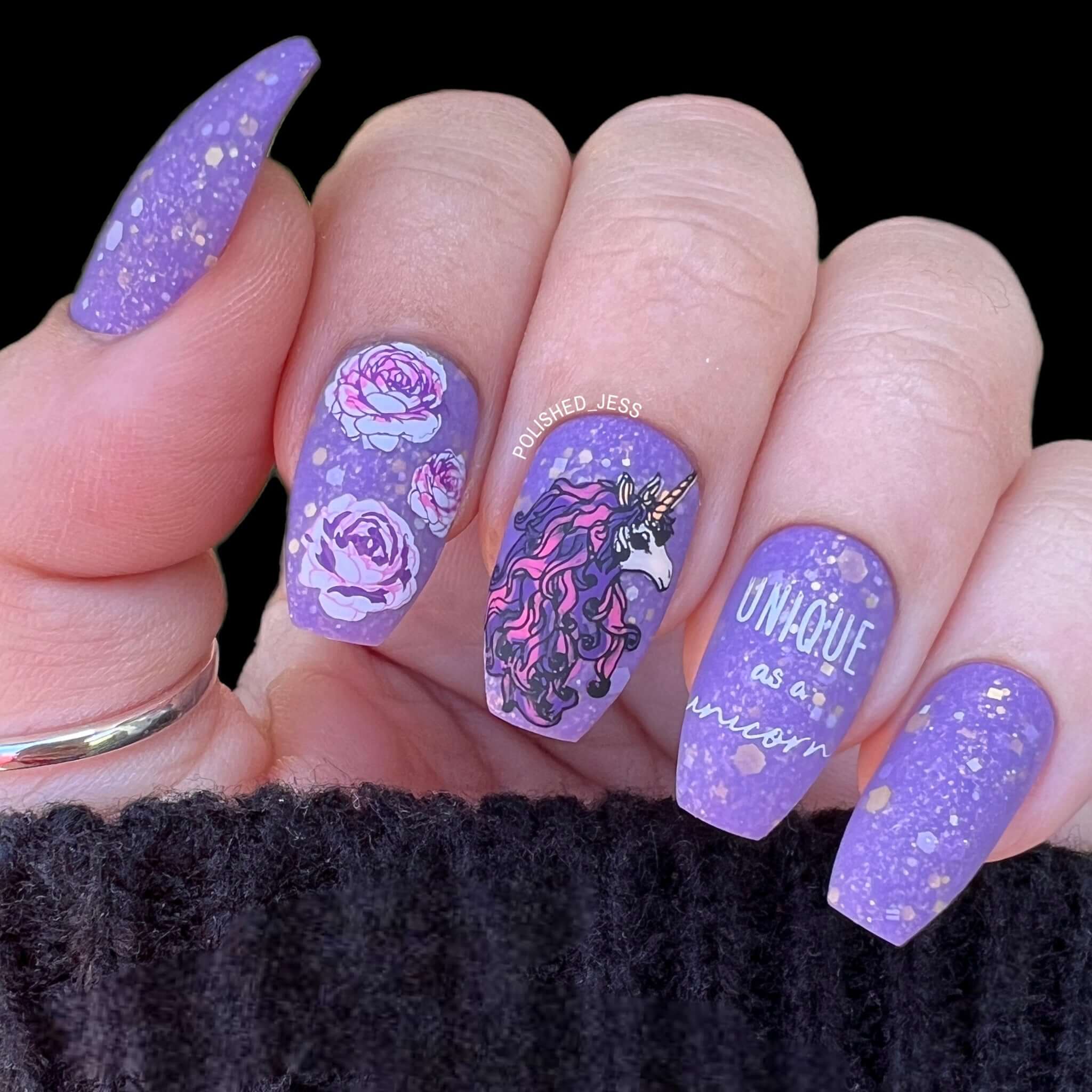 beautiful-manicure-showing-nail-art-designs-of-a-unicorn-with-roses