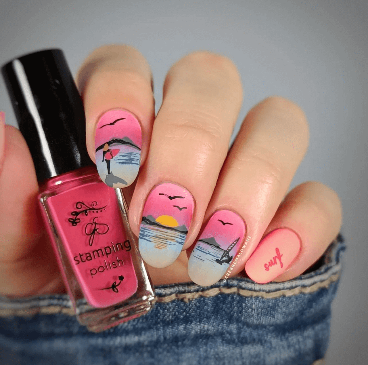 Stunning-manicure-showing-nail-art-designs-of-a-beach-sunset-scene-surf