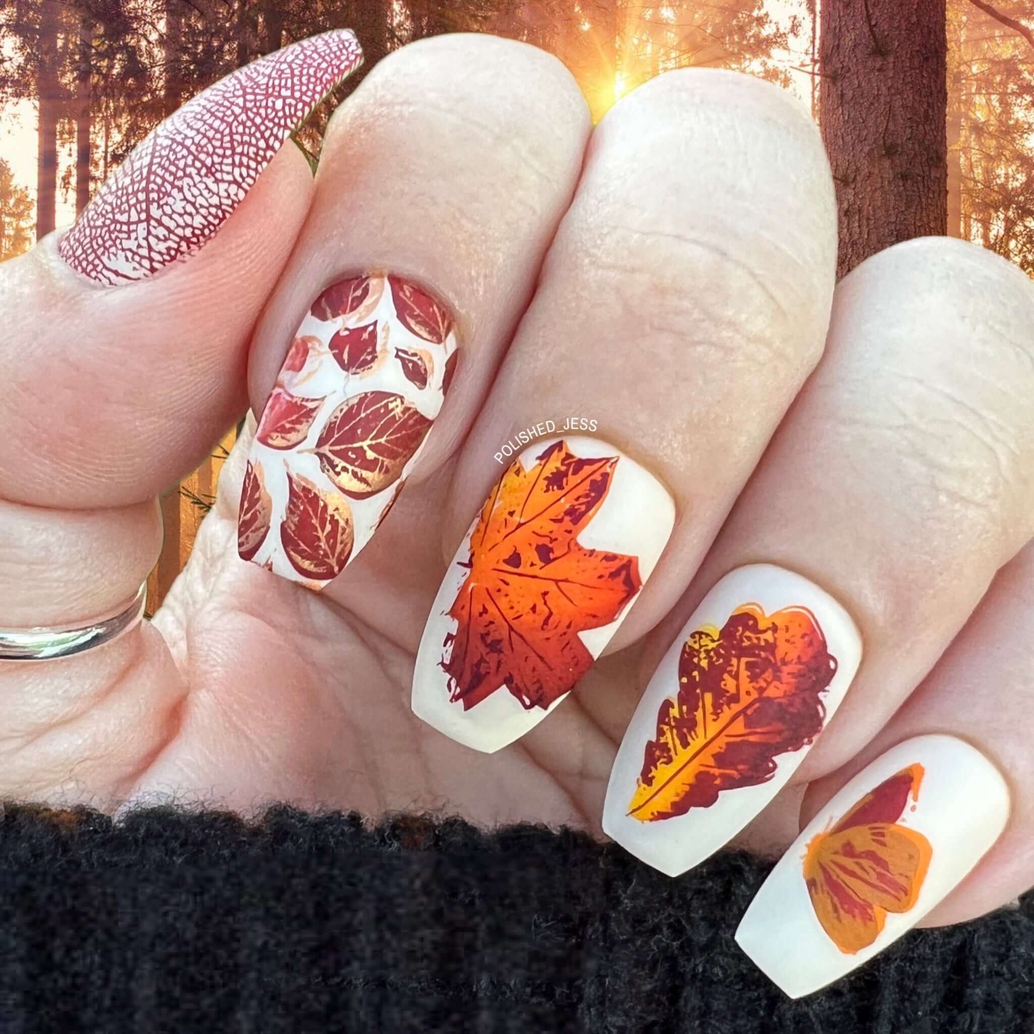 manicure-showing-nail-art-designs-of-fall-leaves