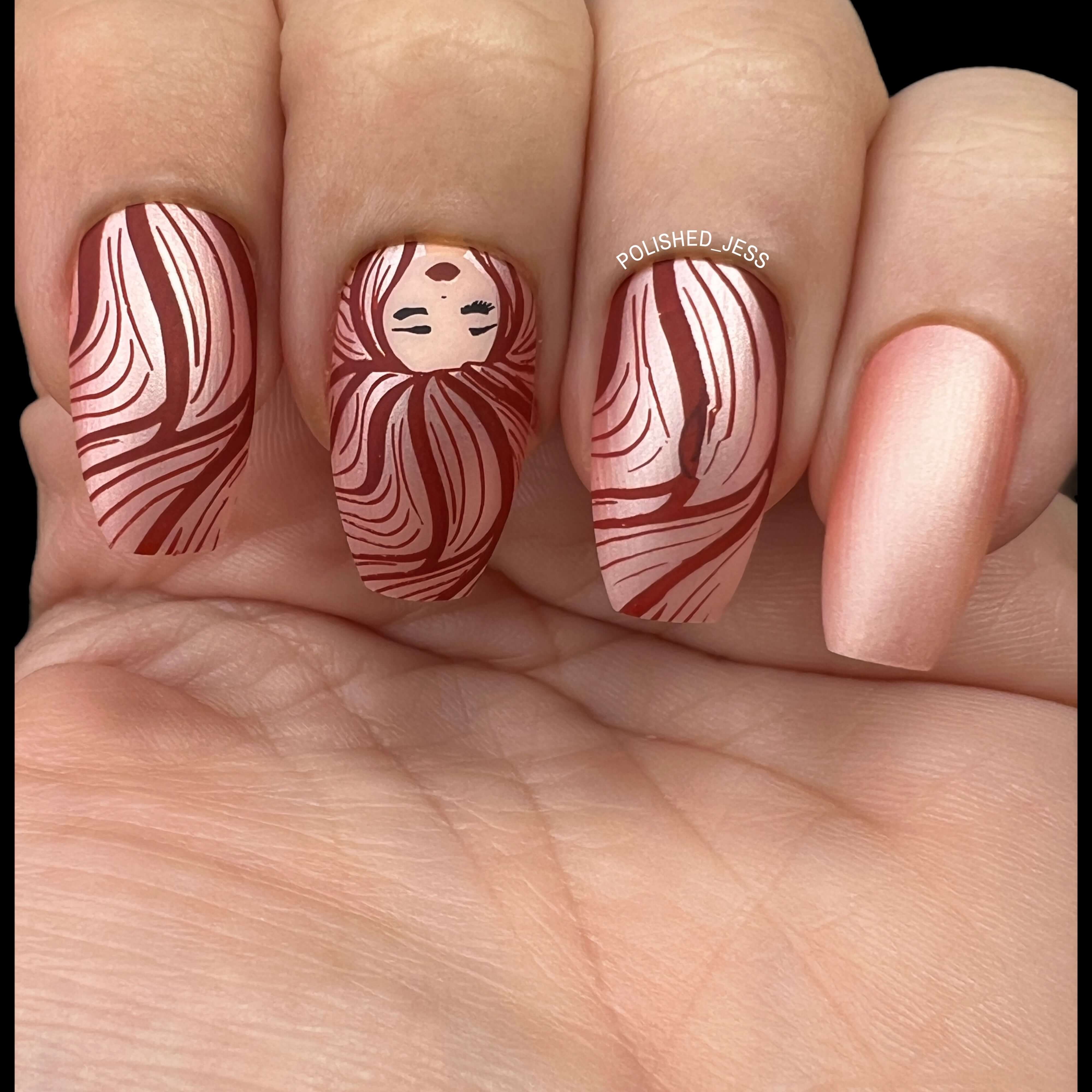 beautiful-manicure-of-nail-art-showing-a-girl-and-her-long-hair