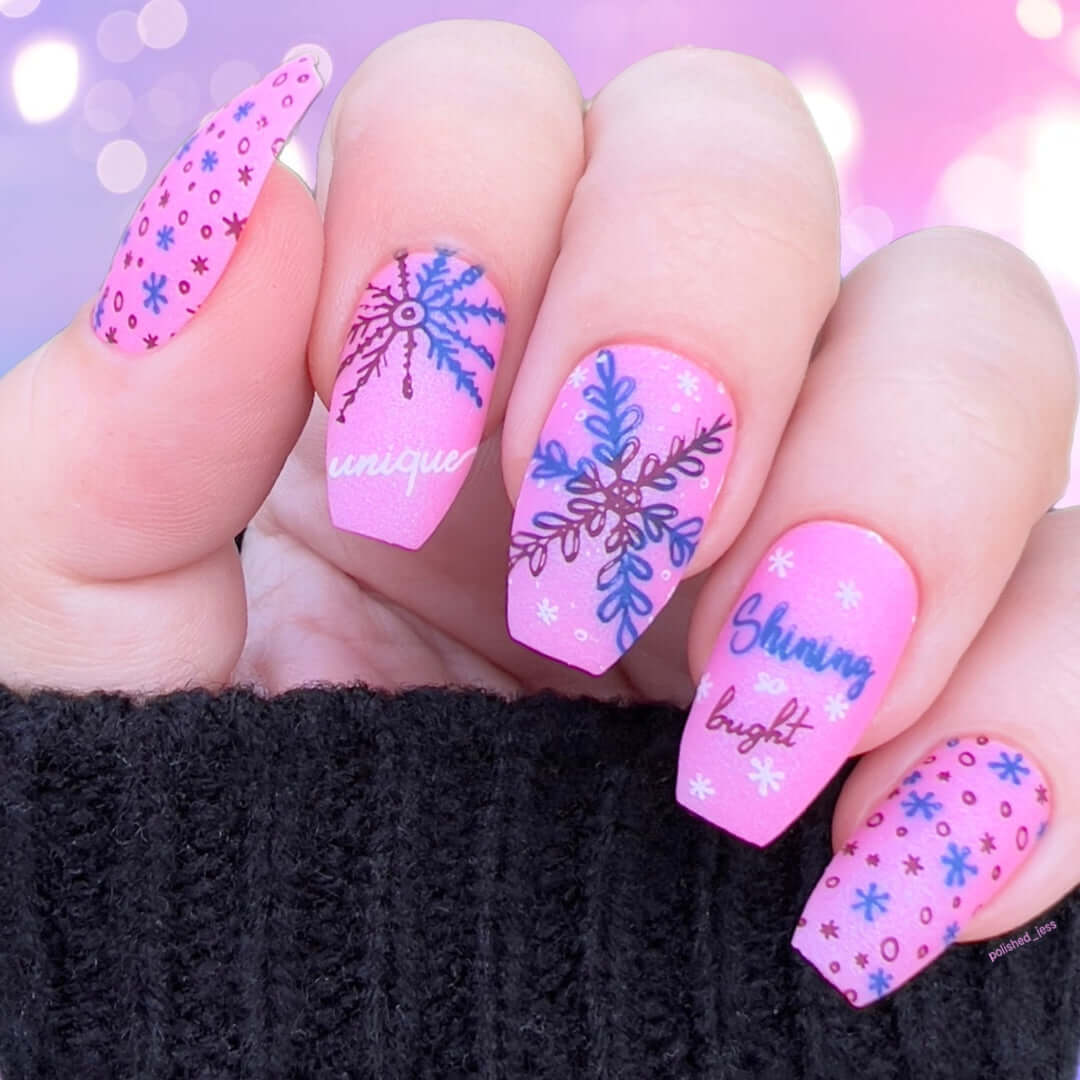 bright-manicure-showing-nail-art-designs-of-snowflakes-with-the-words-shinning-bright-and-unique