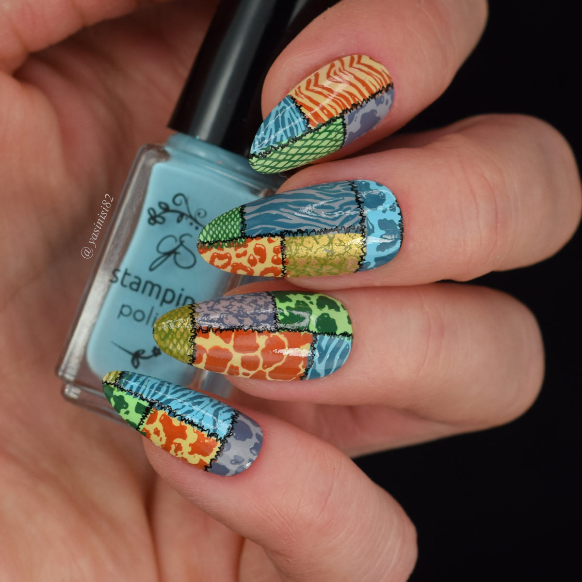 Beautiful-manicure-showing-nail-art-designs-of-animal-print-patchwork