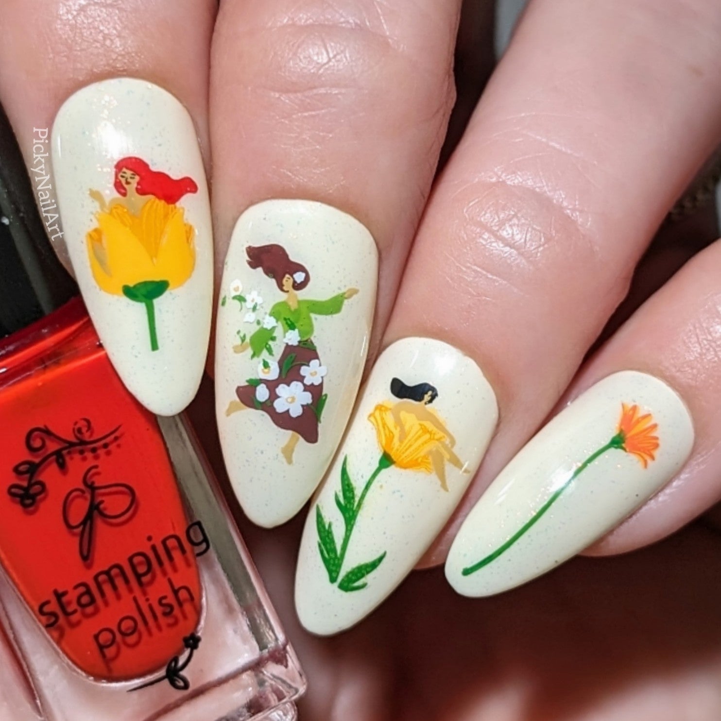 manicure-showing-nail-art-designs-of-naked-ladies-sitting-in-flowers