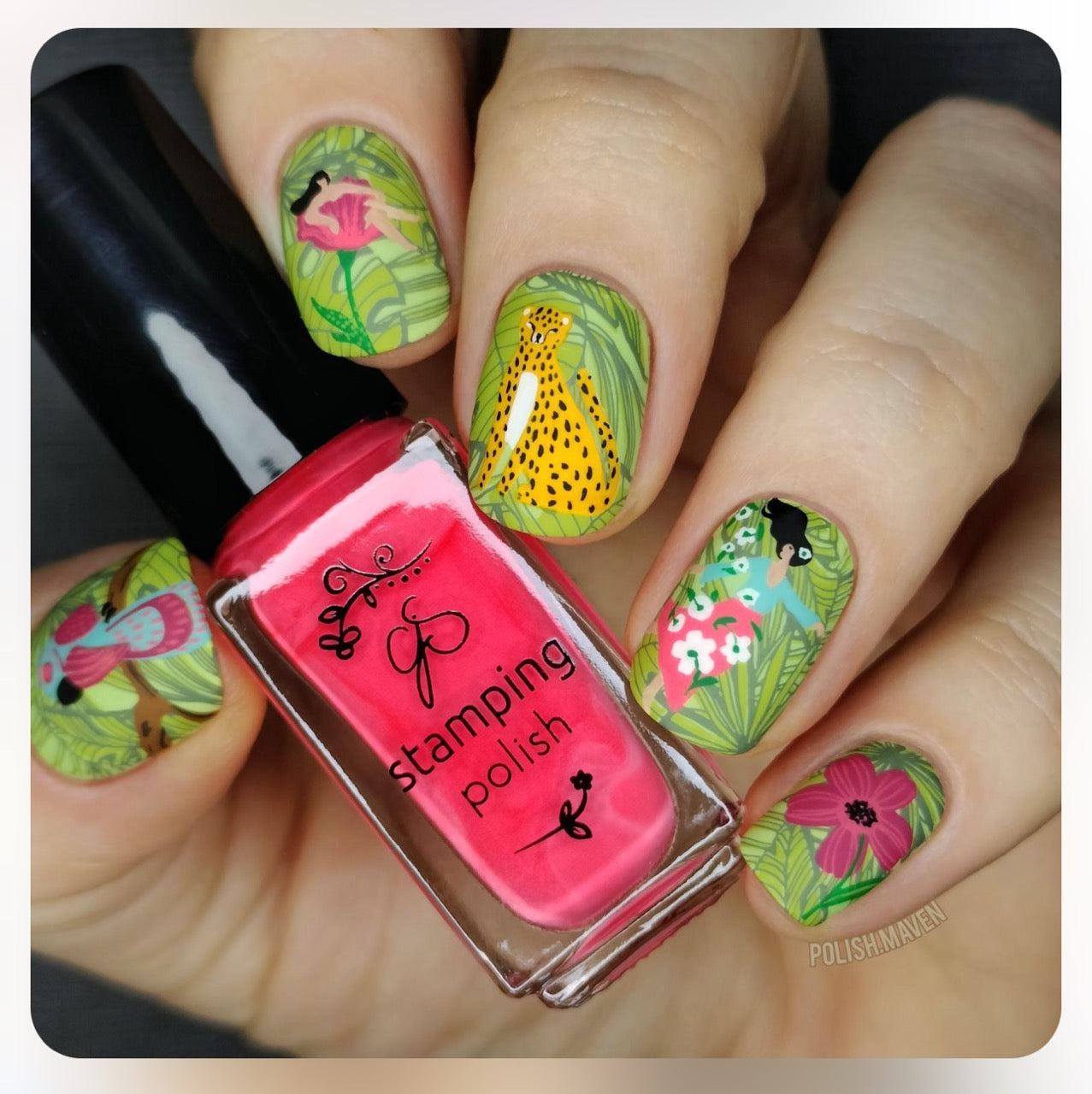 Manicure-showing-nail-art-designs-of-tropical-flowers-and-a-leopard