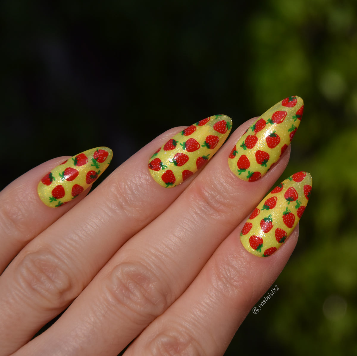 Beautiful-yellow-shimmer-manicure-with-full-coverage-nail-art-designs-of-little-strawberries