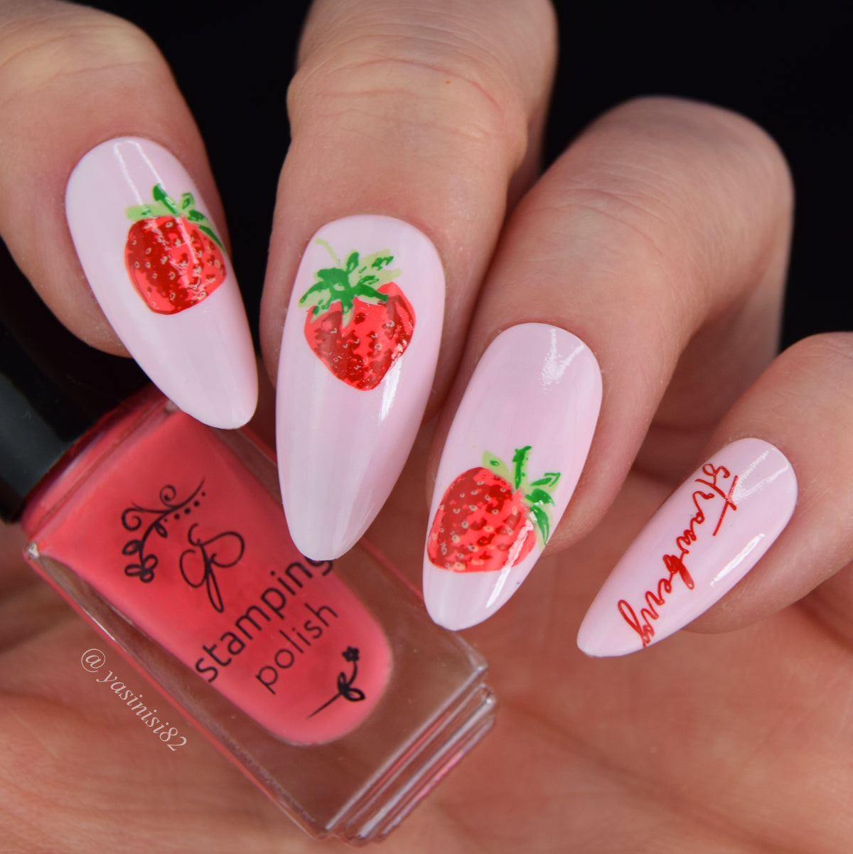 Beautiful-manicure-showing-nail-art-of-hand-drawn-strawberries