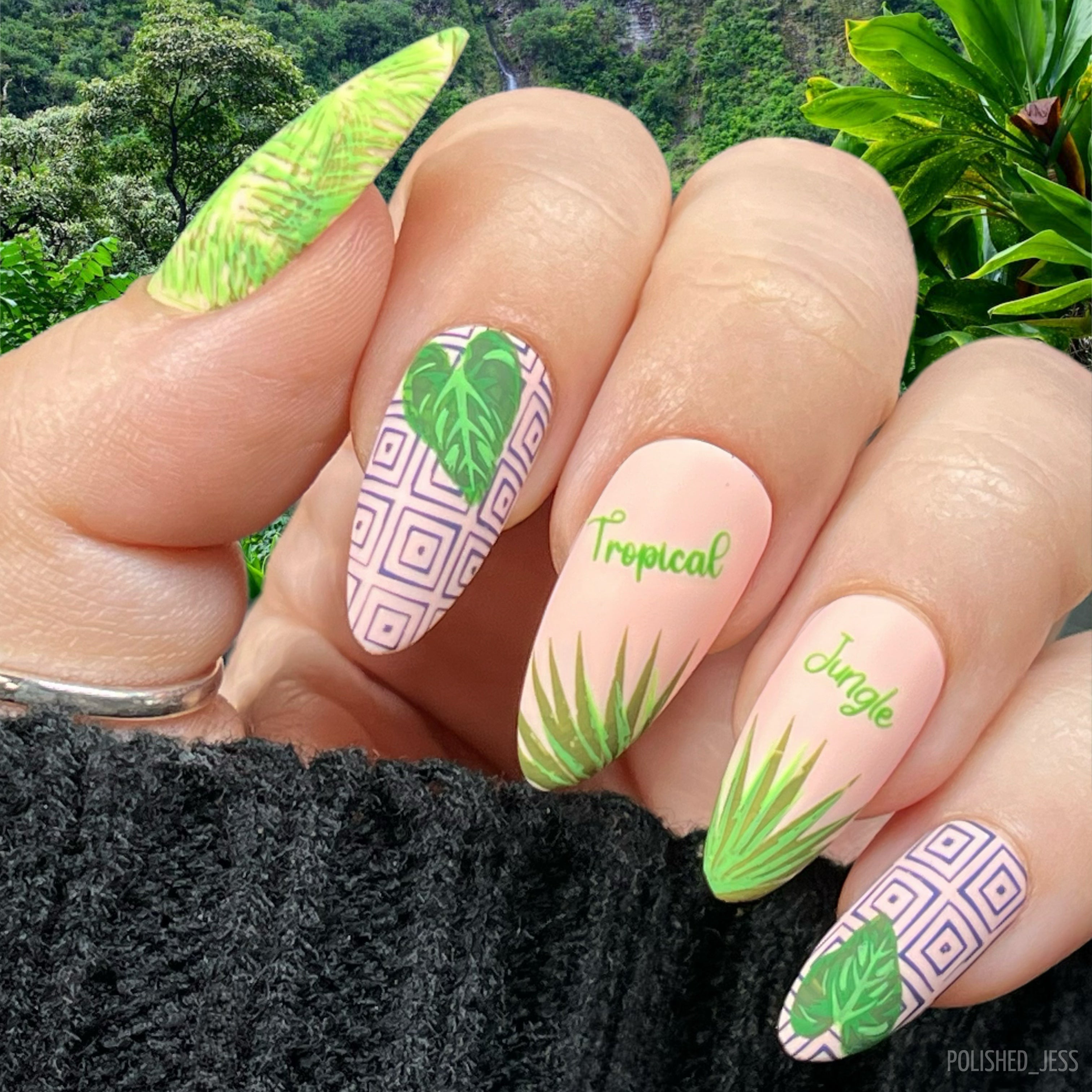 beautiful-manicure-showing-nail-art-designs-of-tropical-leaves-with-geometric-patterns