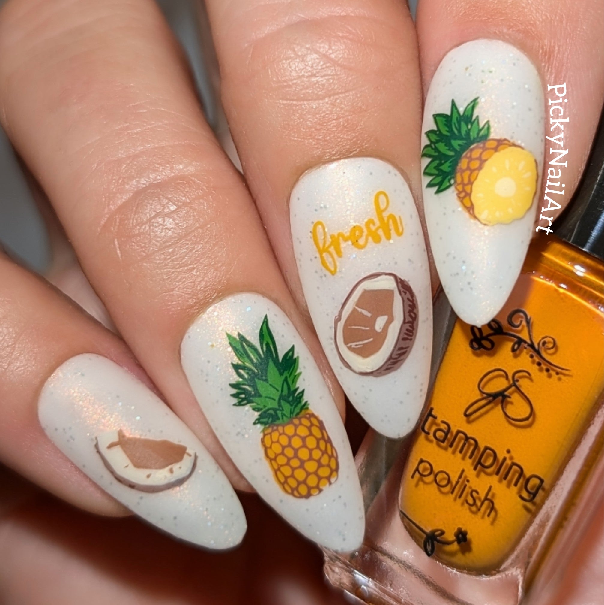 beautfiul-manicure-with-nail-art-designs-of-pineapples-and-coconuts-with-the-word-fresh