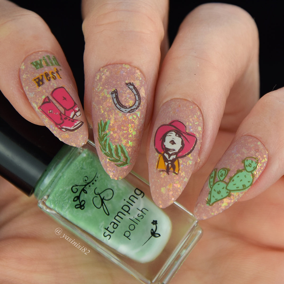 beautiful-manicure-wild-west-horseshoe-girl-in-a-cowboy-hat-and-cactus-trees