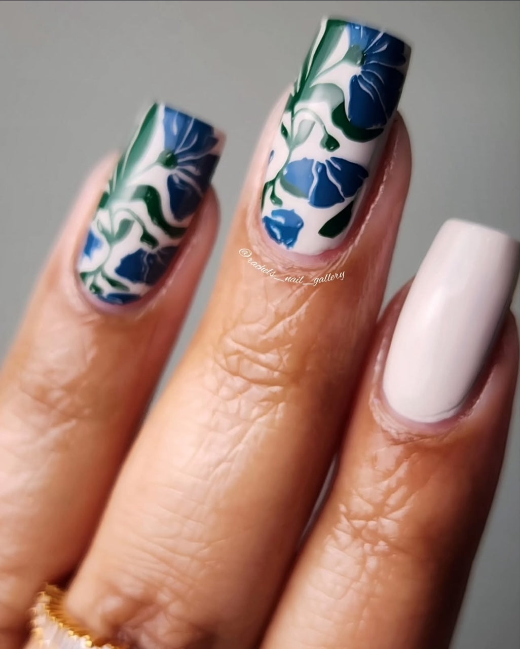 manicure-with-nail-art-stamping-designs-of-abstract-flowers-and-leaves