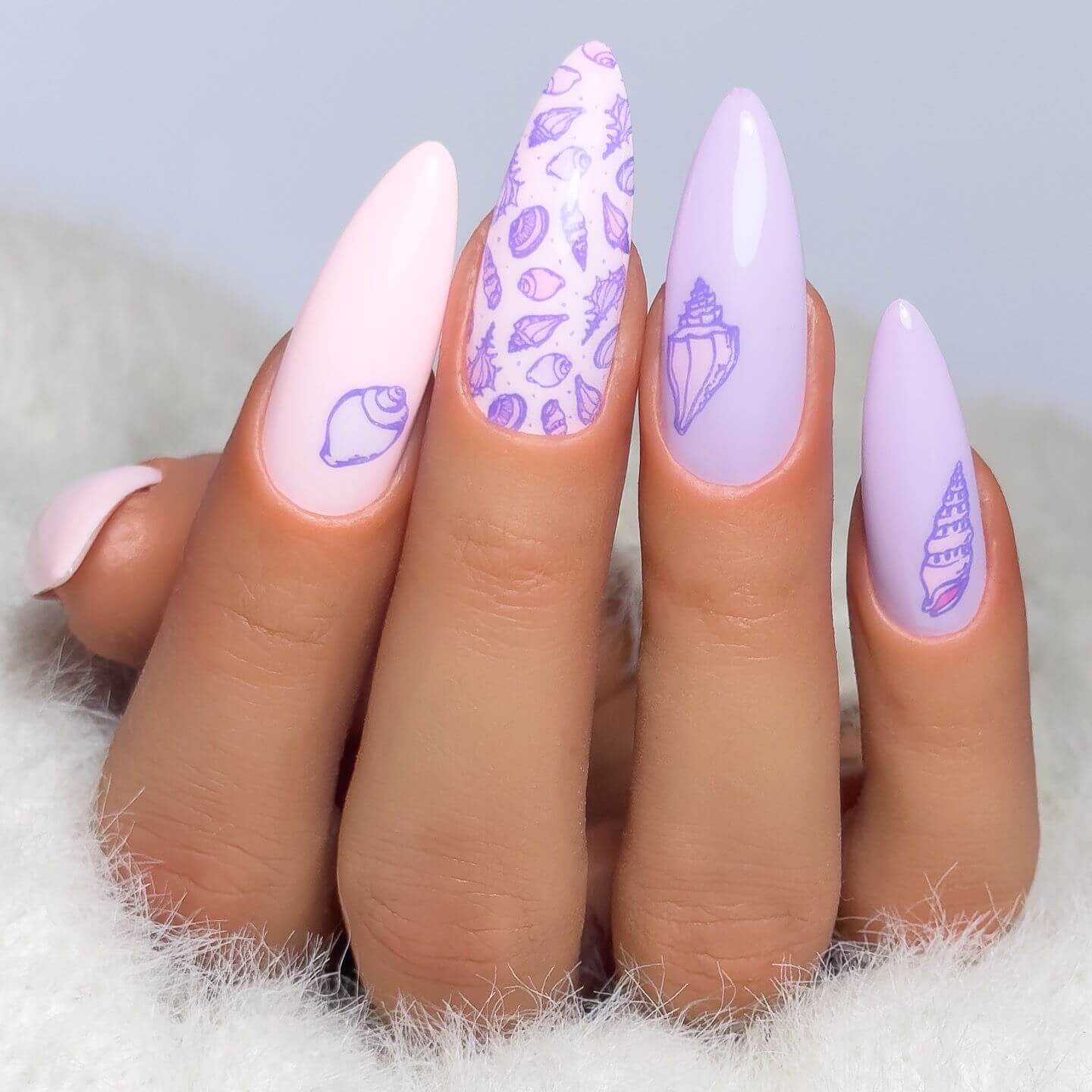 bright-purple-nail-art-featuring-layered-seashells-and-a-beachy-mani