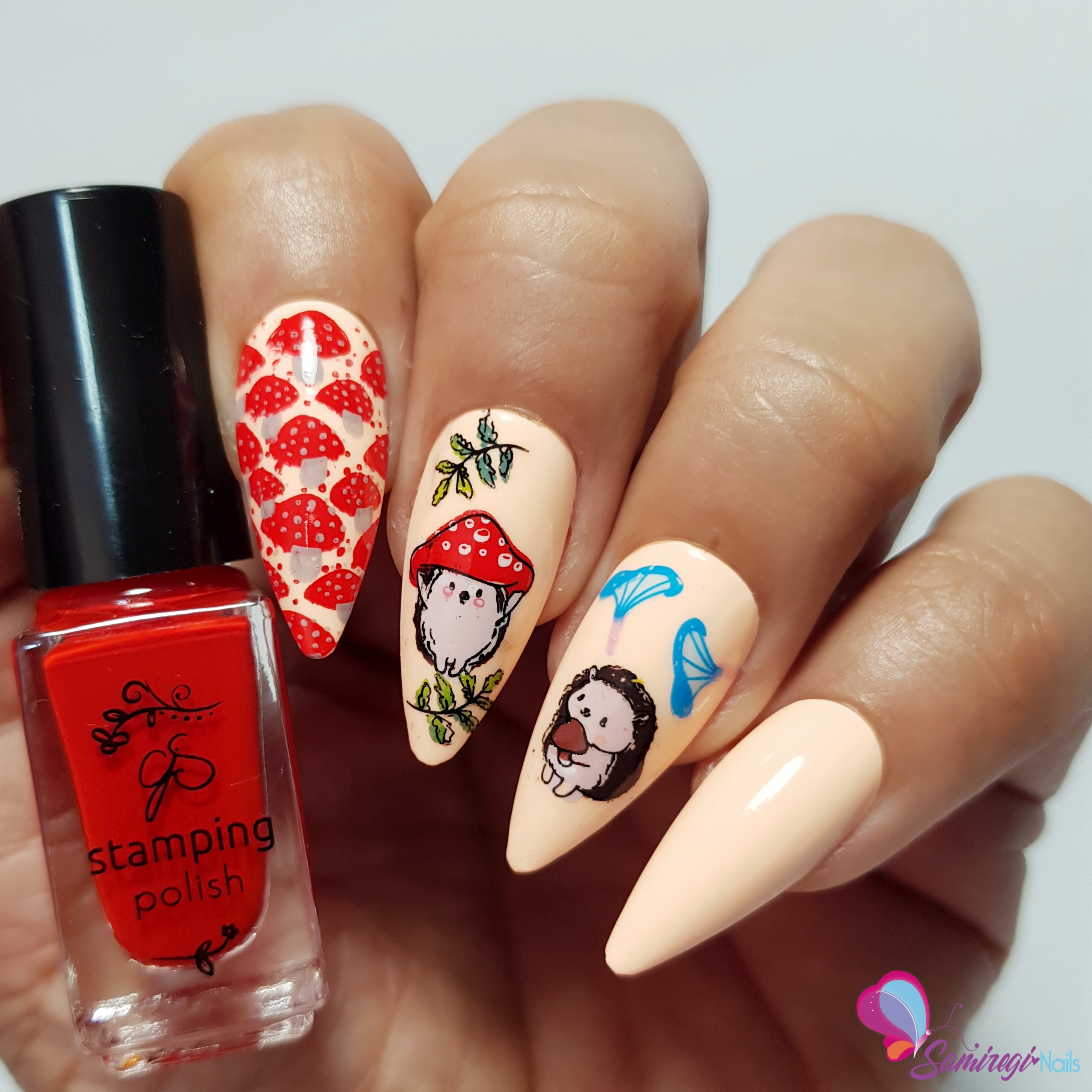 stunning-manicure-with-nail-art-designs-of-a-hedgehog-wearing-a-toadstool-hat