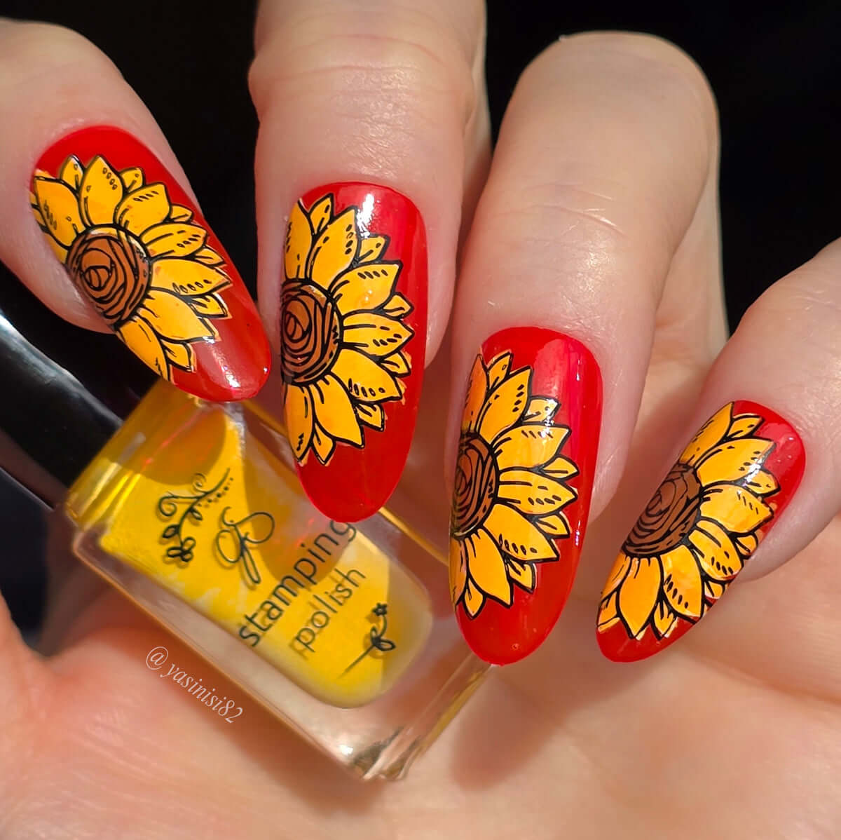 bright-bold-manicure-with-nail-art-designs-of-sunflower-heads