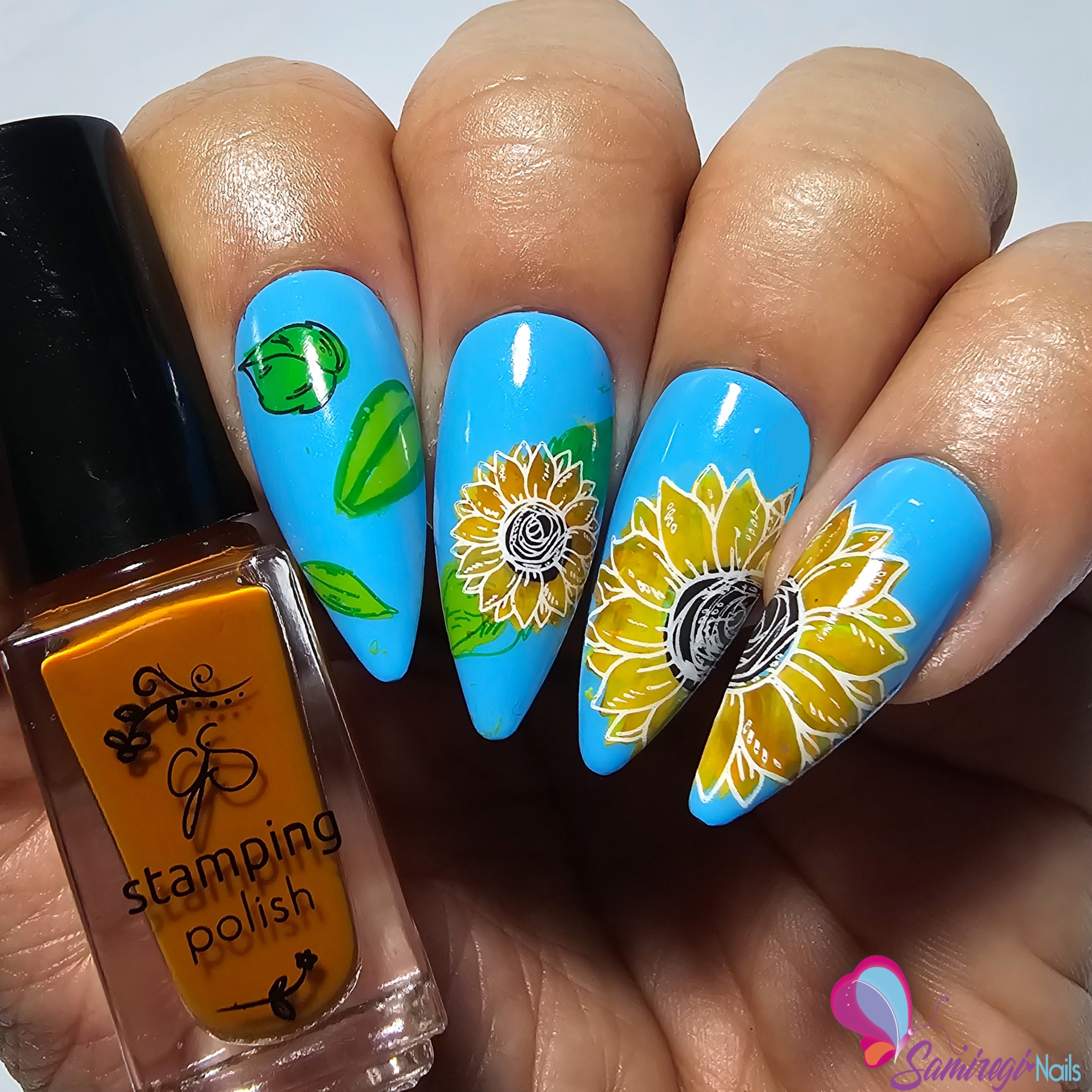 bright-bold-manicure-with-nail-art-designs-of-sunflowers