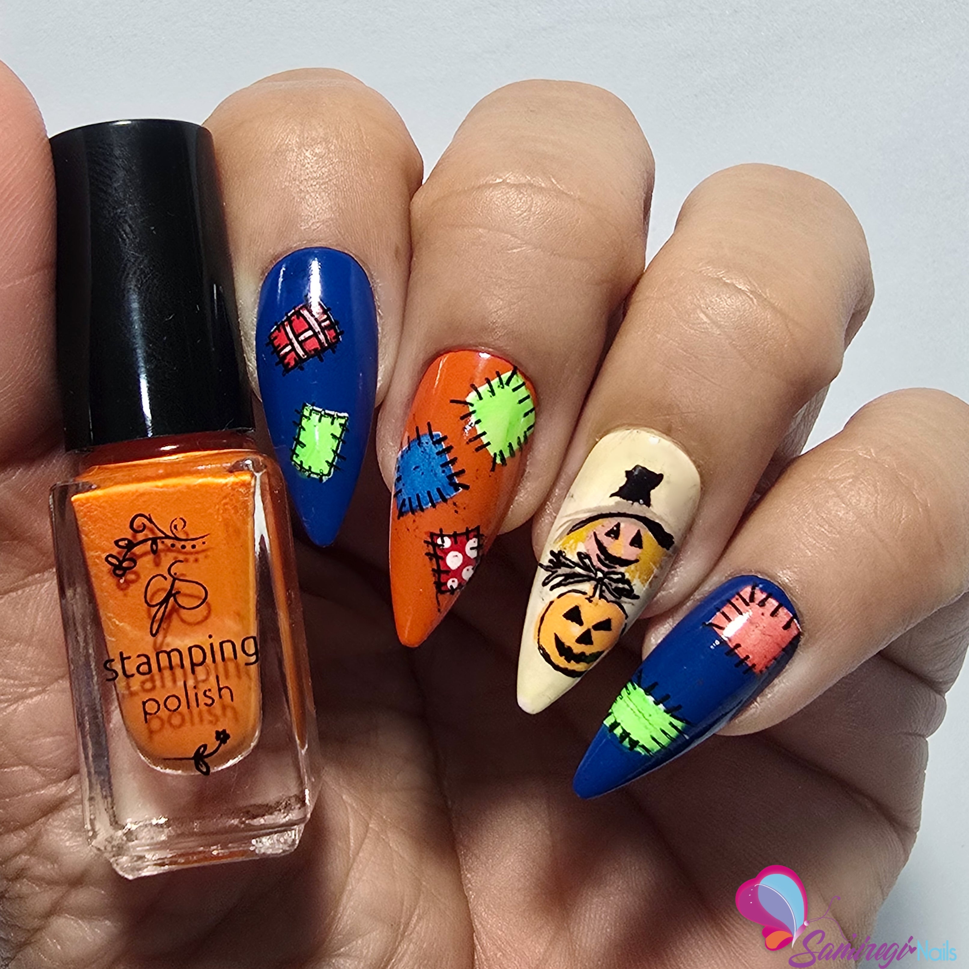 stunning-manicure-with-nail-art-designs-of-a-scarecrow-and-cloth-patches