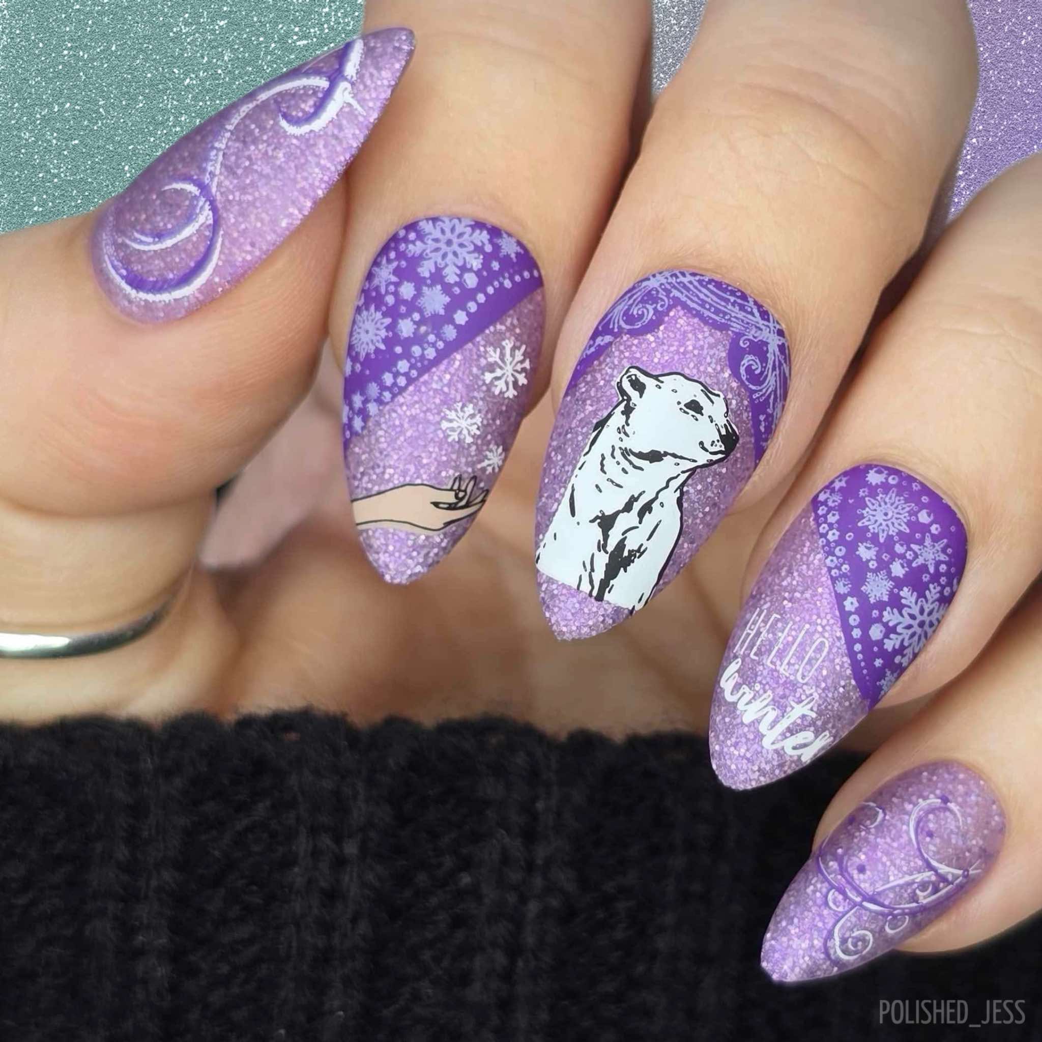 stunning-manicure-with-wintery-nail-art-of-snowflakes-and-a-polar-bear