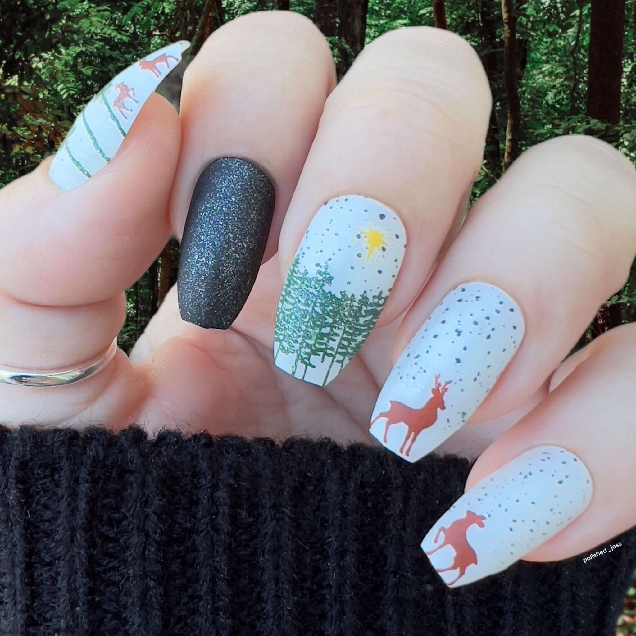 stunning-manicure-with-stamping-nail-art-design-of-a-winter-scene-with-deer-and-snow-falling