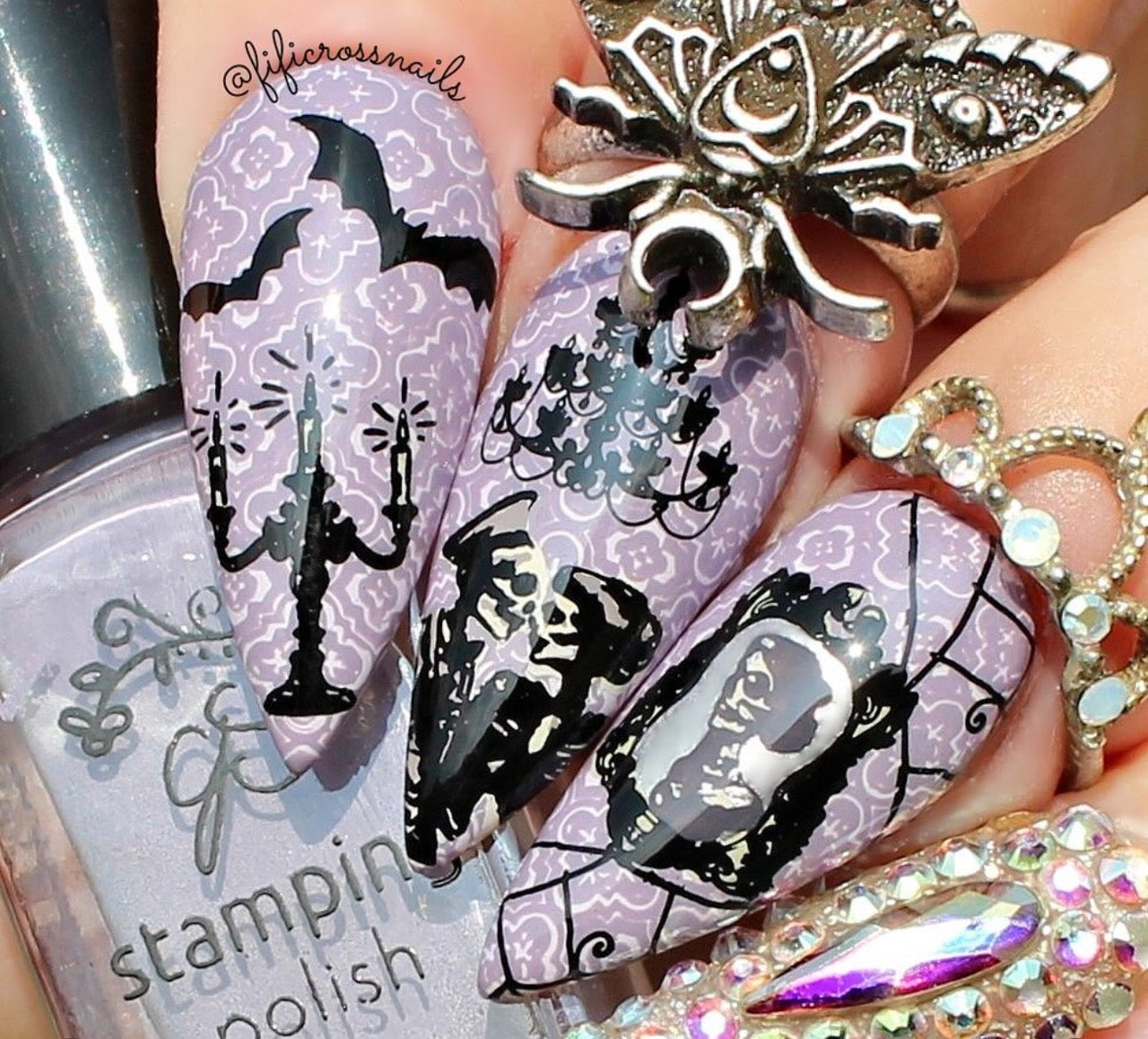 stunning-manicure-with-nail-art-designs-of-a-skeleton-couple-with-chandelier-mirror-bats