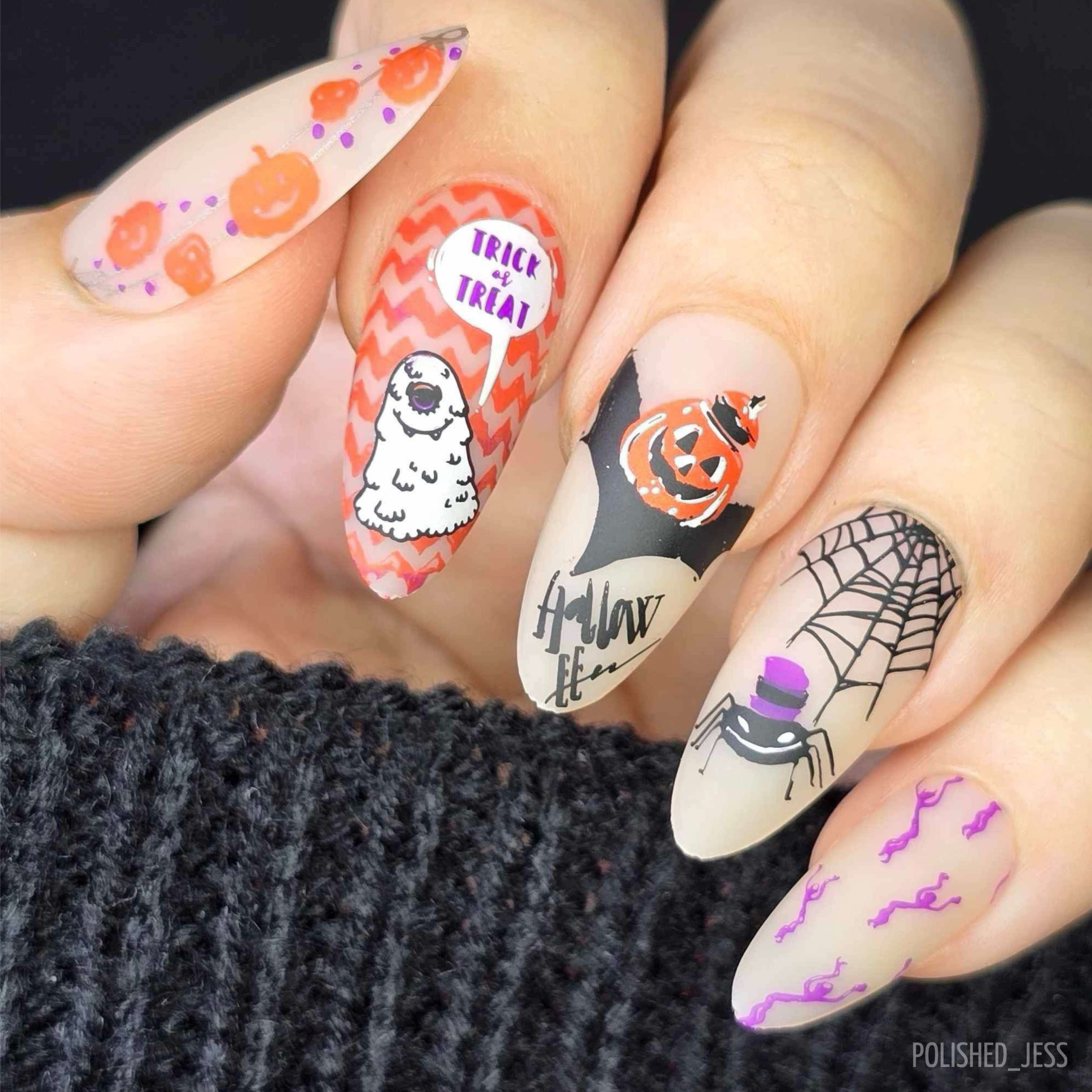 stunning-manciure-with-halloween-themed-nail-art-stamping-designs