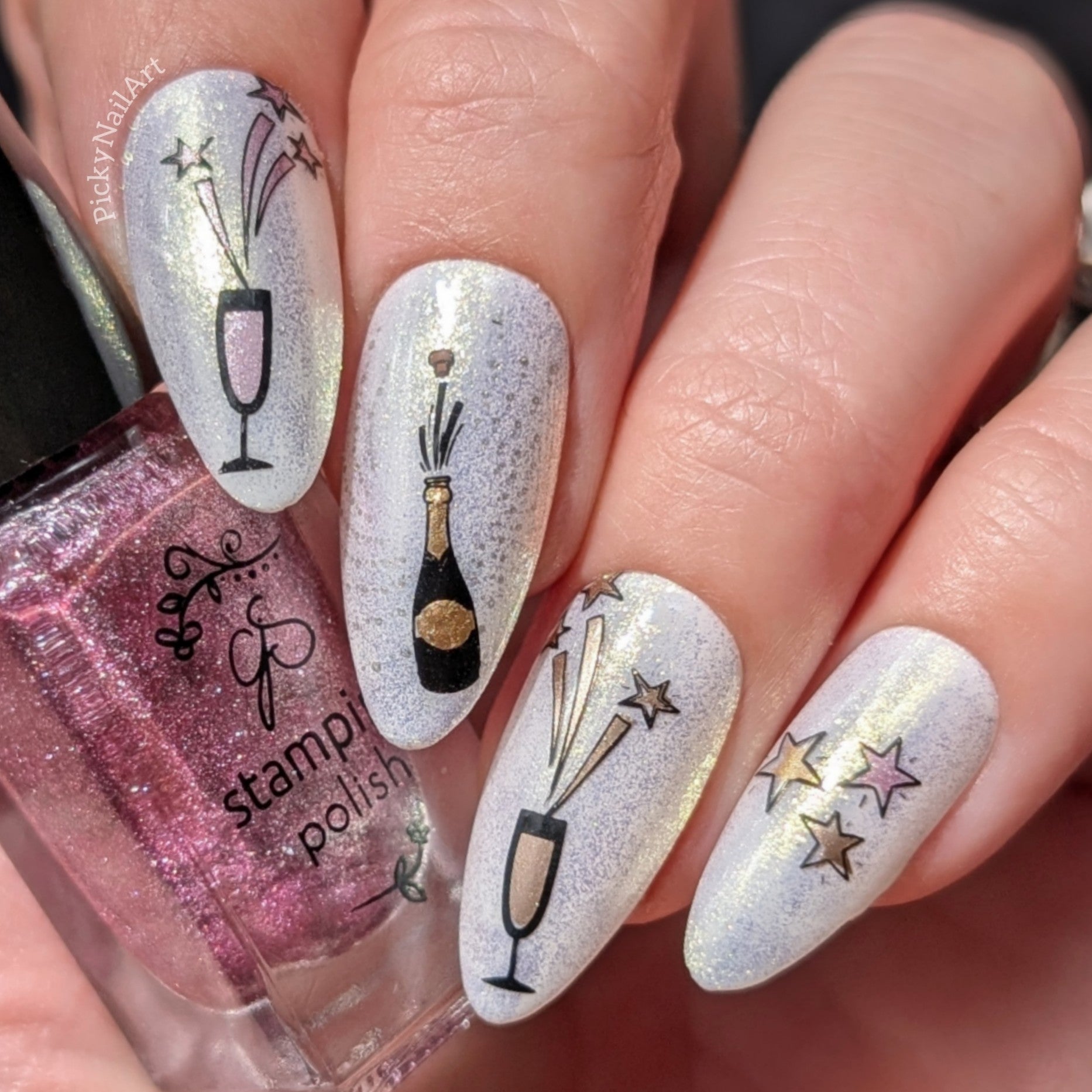 gorgeous-shimmery-manicure-with-nail-art-designs-of-champagne-flutes-a-champagne-bottle-popping-and-stars