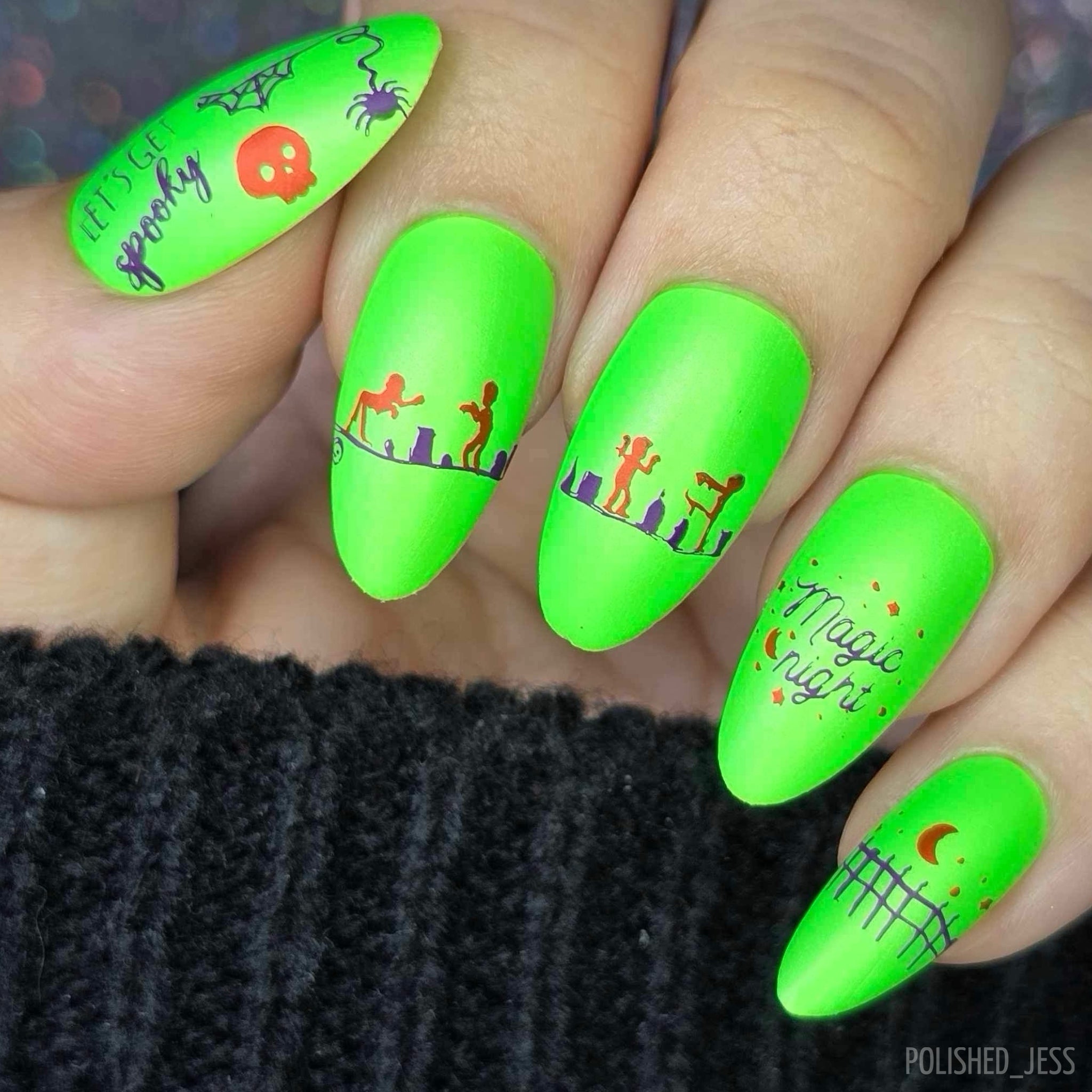 bright-manicure-with-cute-Halloween-nail-art-designs-and-the-words-magic-night