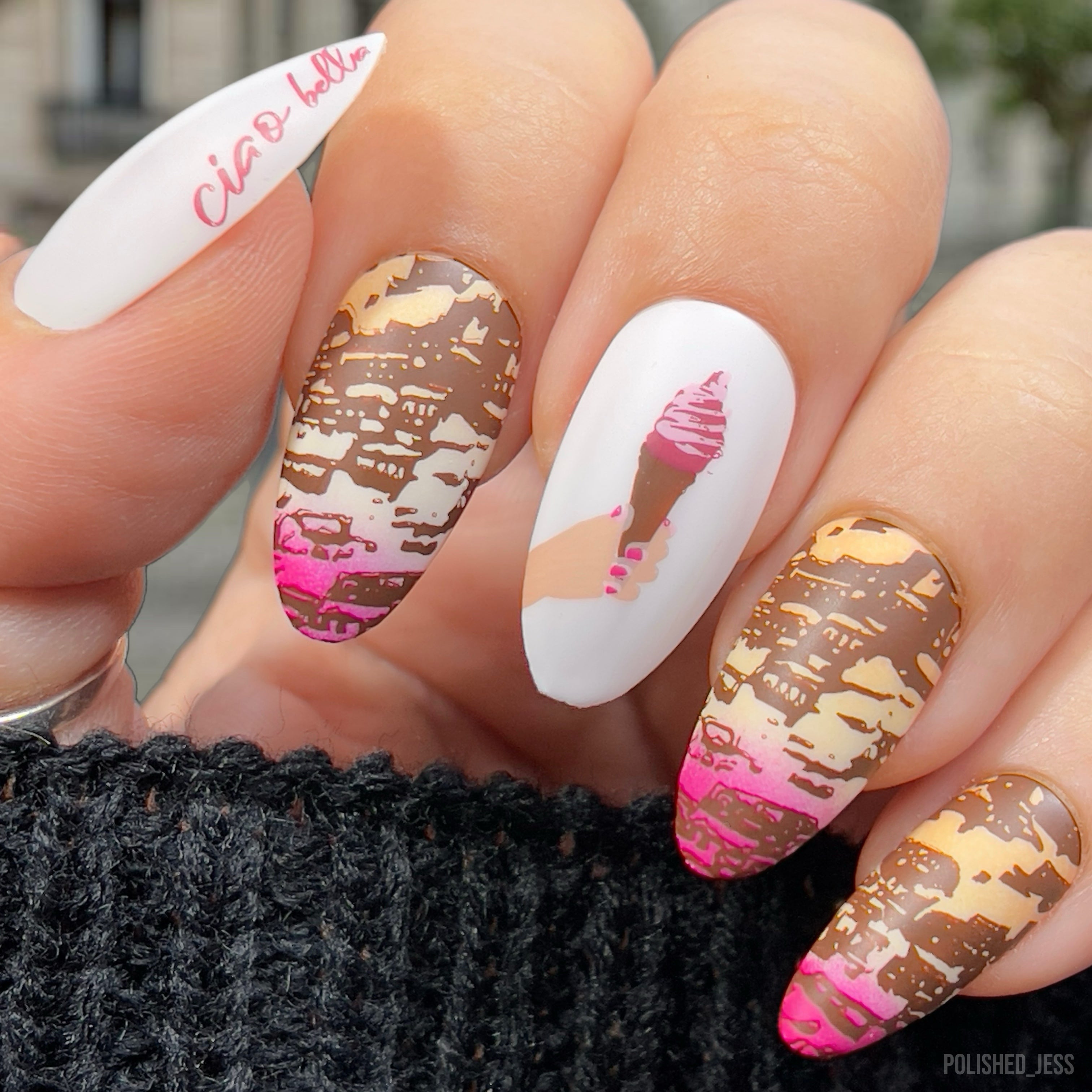 beautiful-manicure-showing-nail-art-designs-of-italian-city-and-hand-holding-ice-cream