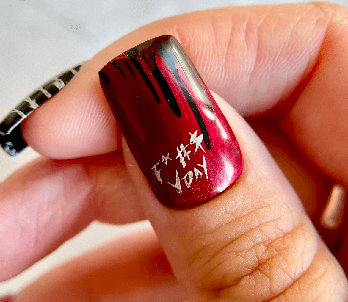 single-manicure-nail-with-art-designs-of-dripping-blood-and-words-f-*-#-K-VDay