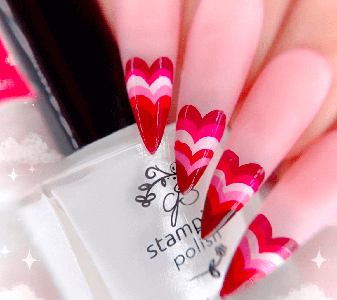 stunning-manicure-with-french-tip-nail-art-in-the-shape-of-hearts