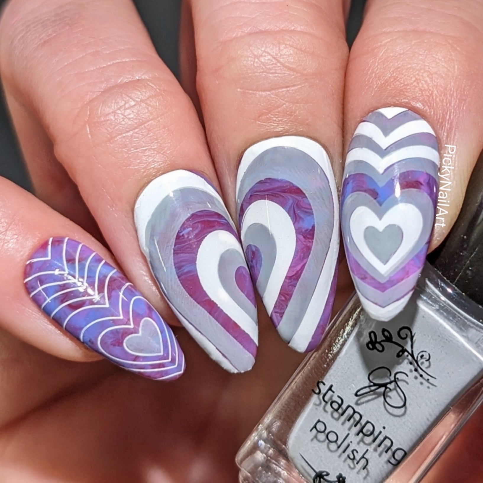 manicured-hand-with-stunning-valentines-nail-art-designs-of-hearts