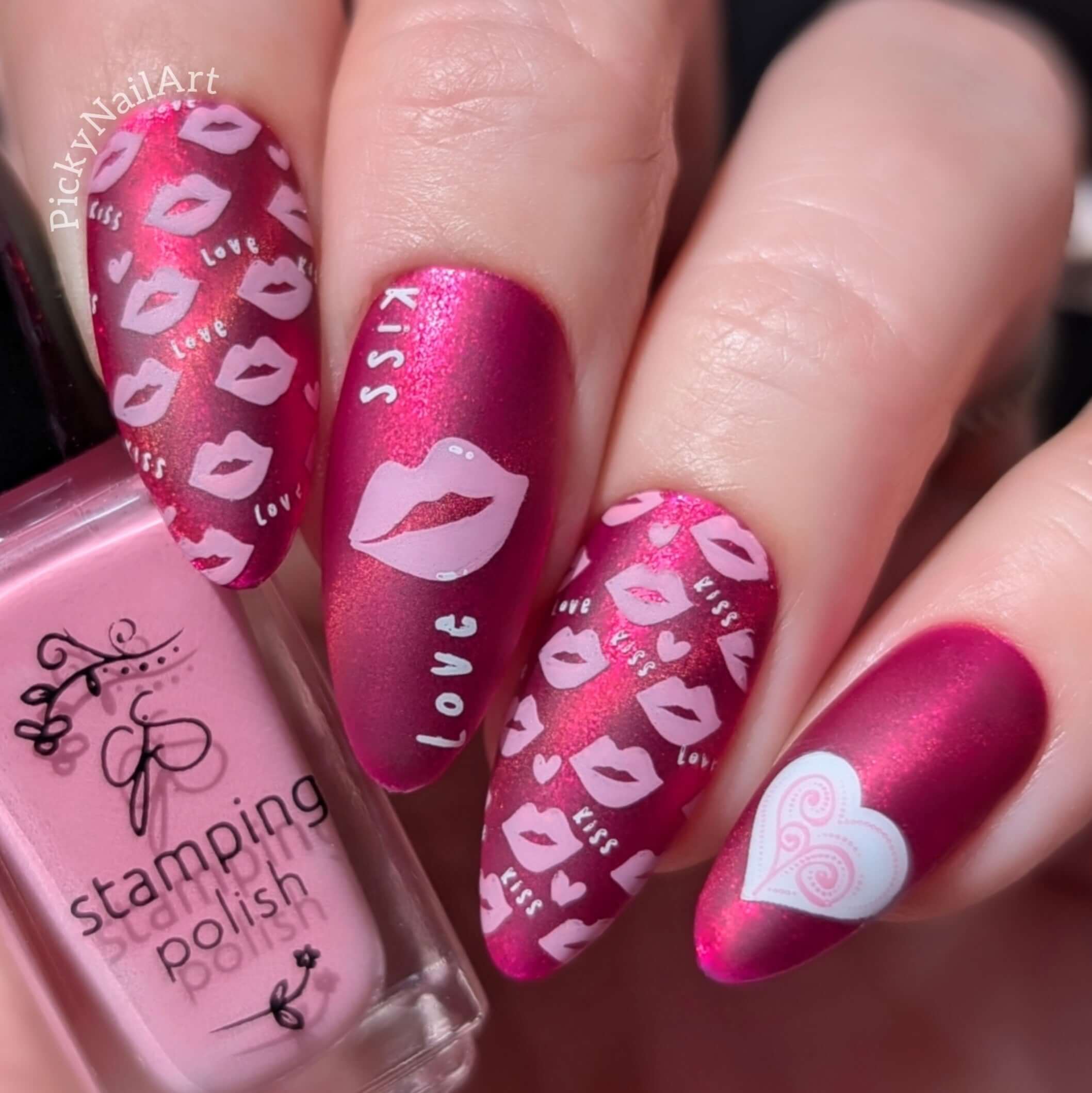 bright-manicure-with-valentines-themed-nail-art-of-lips-and-the-words-lips-and-kiss