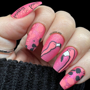 bright-pink-manicure-showing-nail-art-designs-of-flamingos-heads-and-pink-and-black-ink-splats