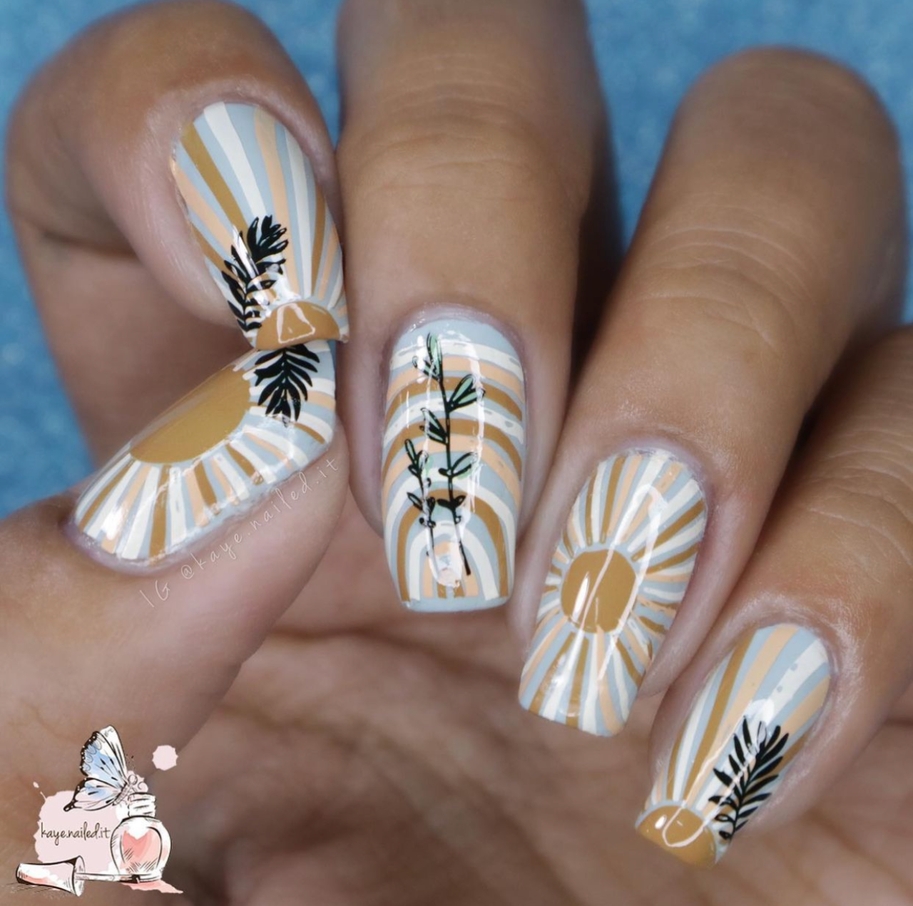 manicure-with-nail-art-boho-arches-sun-beams-and-leafy-branches