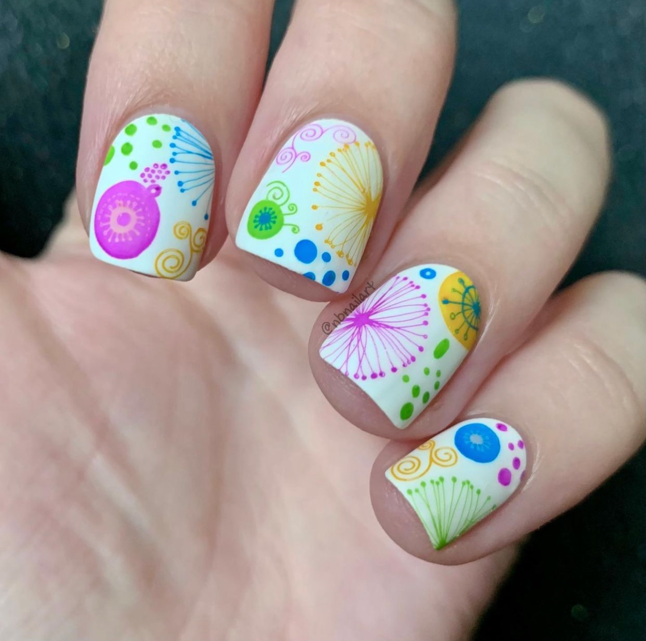 bright-manicure-with-abstract-nail-art-designs-of-swirls-blobs-spines