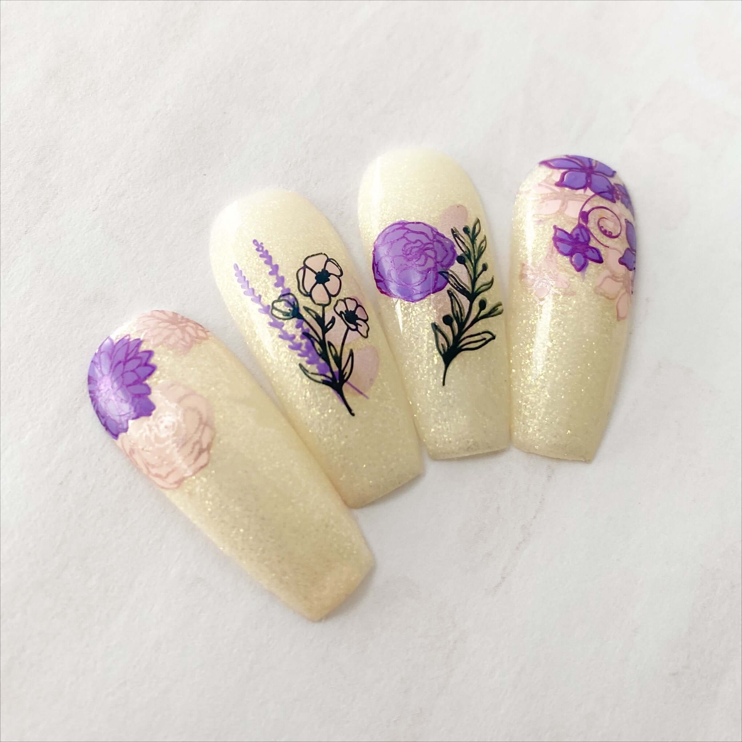 set-of-nail-tip-with-layered-nail-art-designs-of-flowers