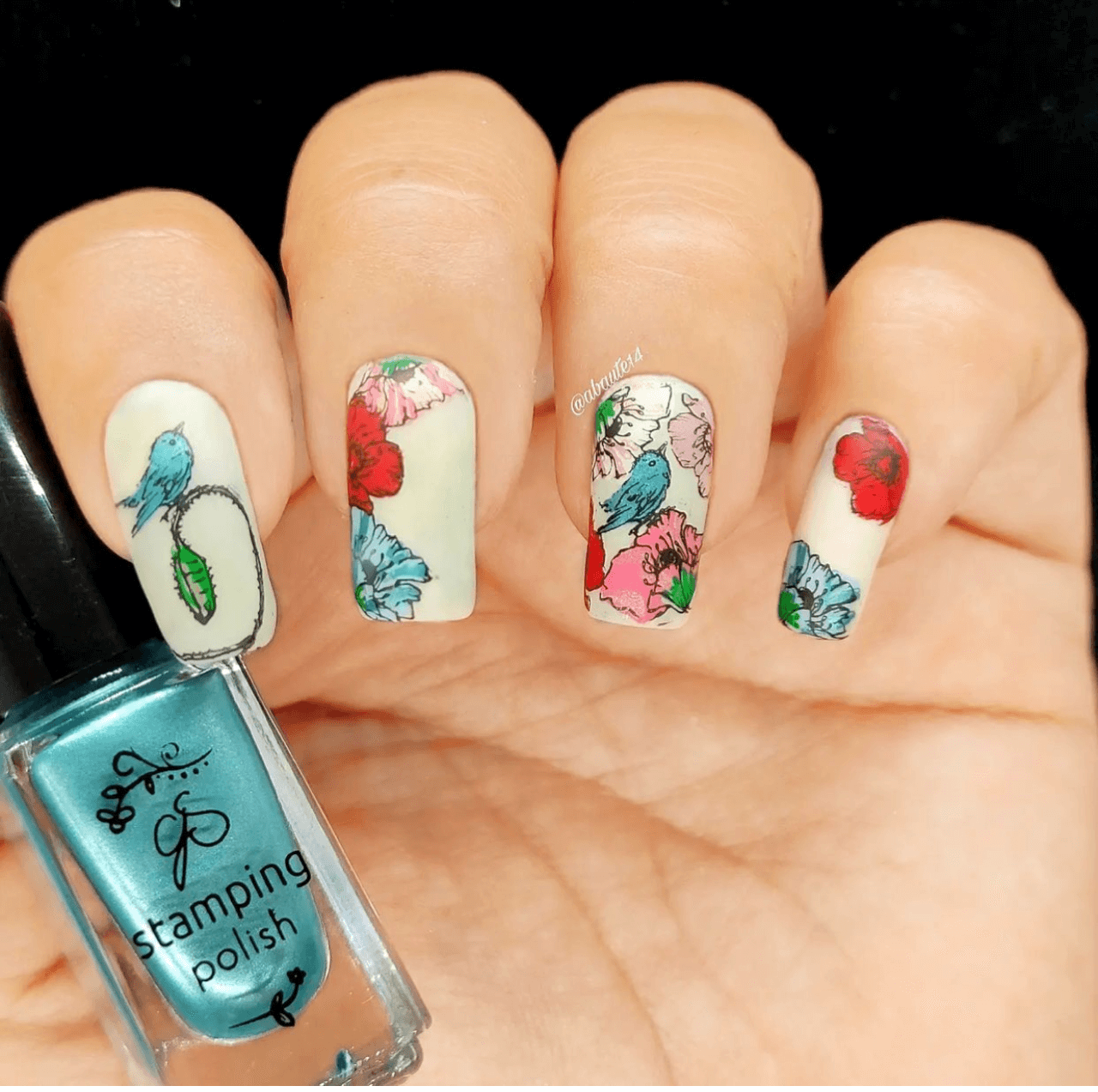 beautiful-manicure-with-nail-art-designs-of-poppies-and-a-bird