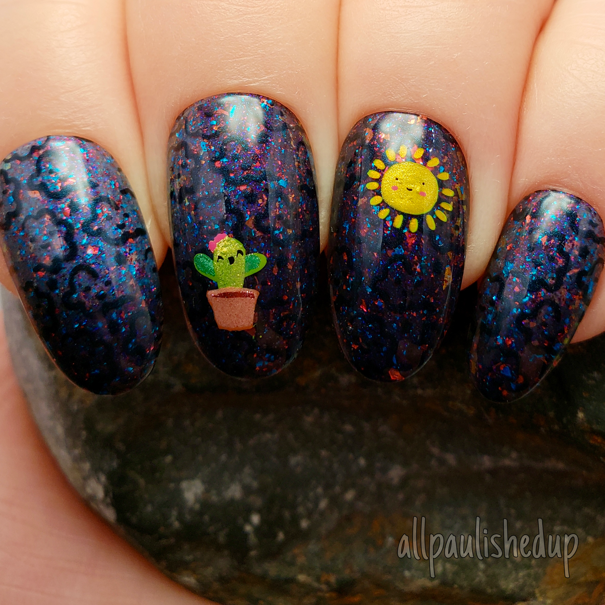 manicure-with-nail-art-designs-of-a-cactus-and-a-sunshine