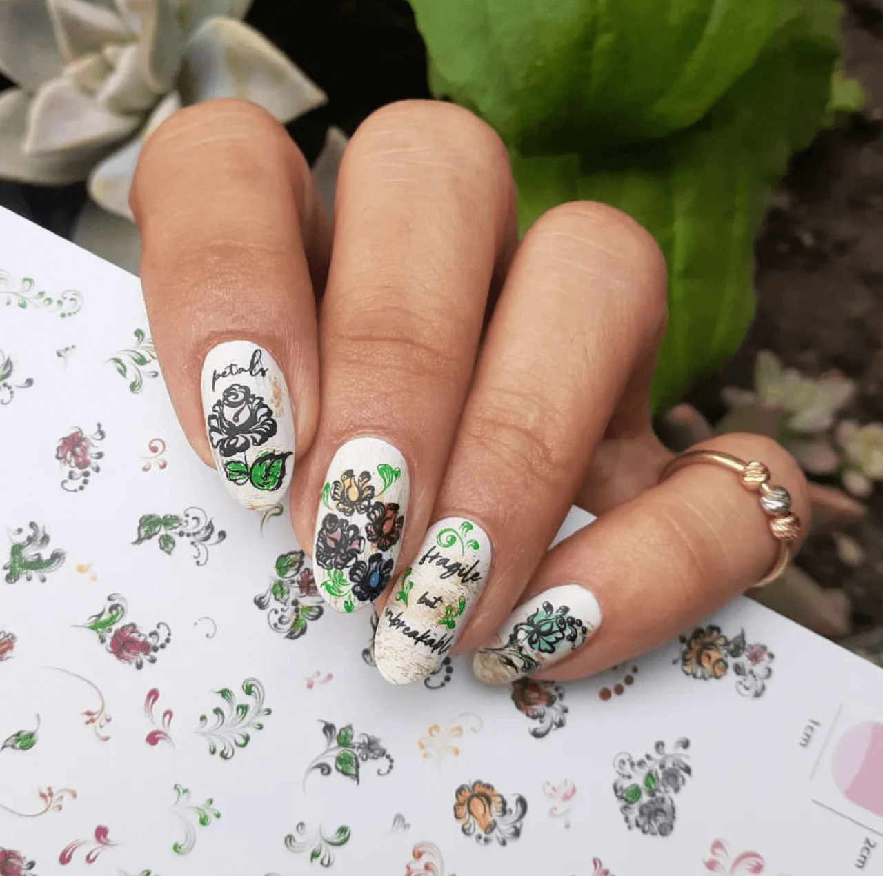 stunning-floral-nail-art-manicure-flowers-swirls-and-words-fragile-and-unbreakable