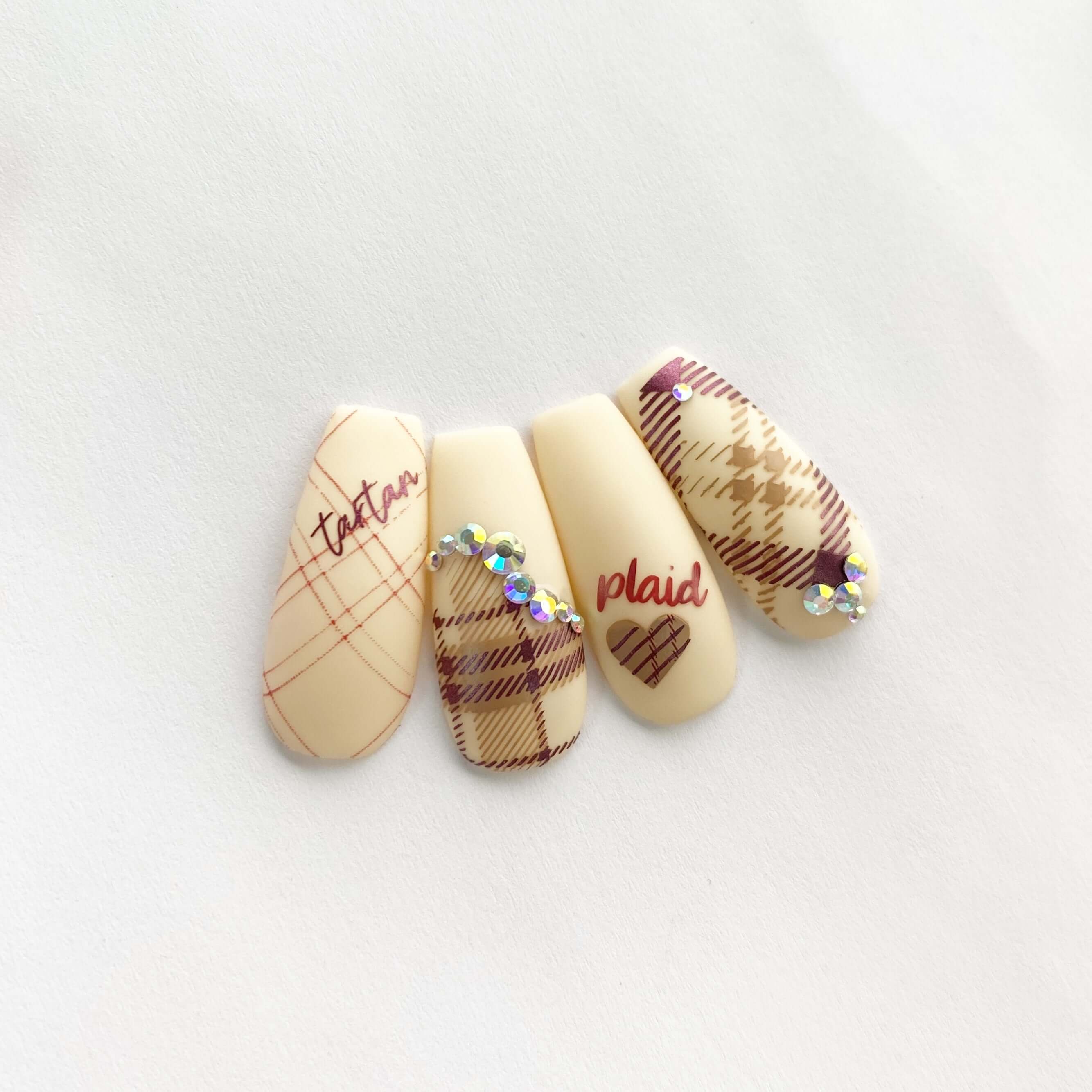 set-of-four-nail-tips-with-plaid-and-tartan-patterns-in-nail-art