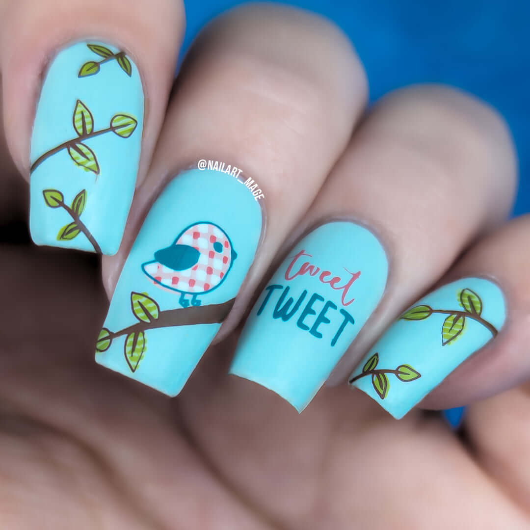 beautiful-manicure-showing-nail-art-designs-of-a-bird-on-branch-with-the-words-tweet-tweet